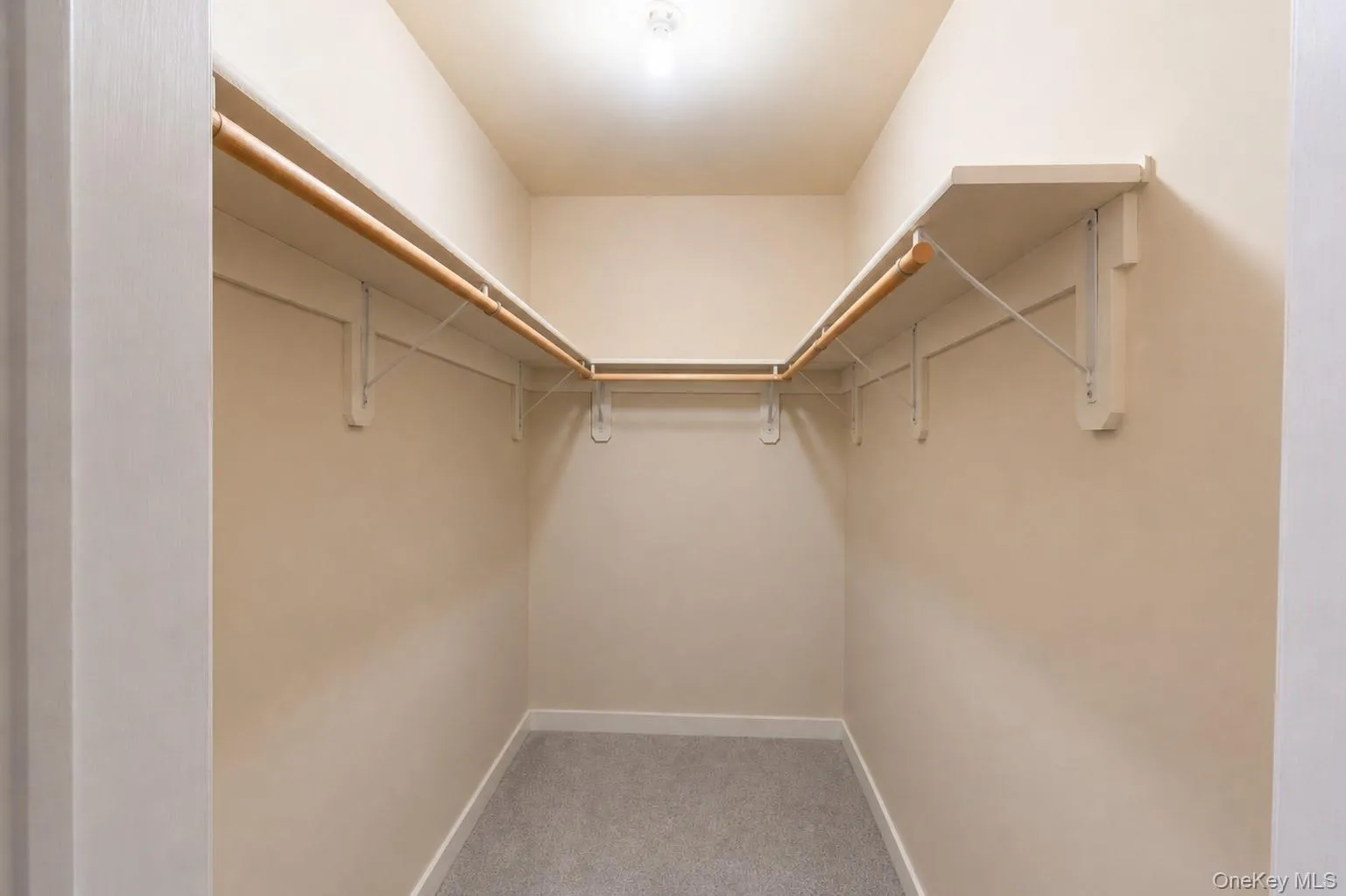 Bedroom #4 walk-in closet (belongings removed with ai) Bedroom #4 walk-in closet (belongings removed with ai)