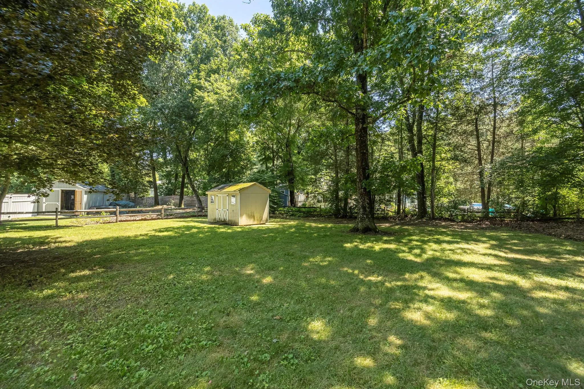 The backyard offers ample room for gardening, pets and outdoor recreation The backyard offers ample room for gardening, pets and outdoor recreation