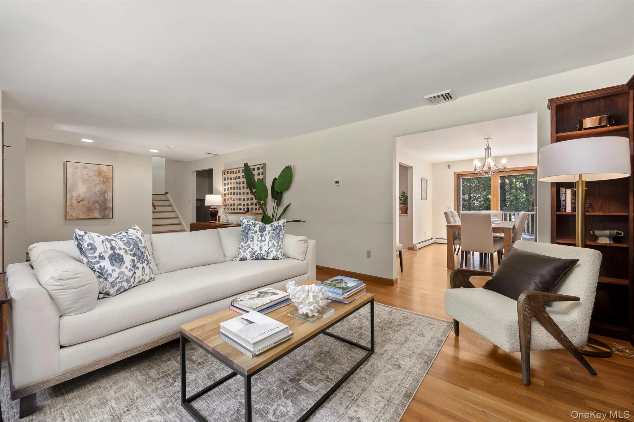 The wide opening between living room and dining room gives a open feeling to the space The wide opening between living room and dining room gives a open feeling to the space