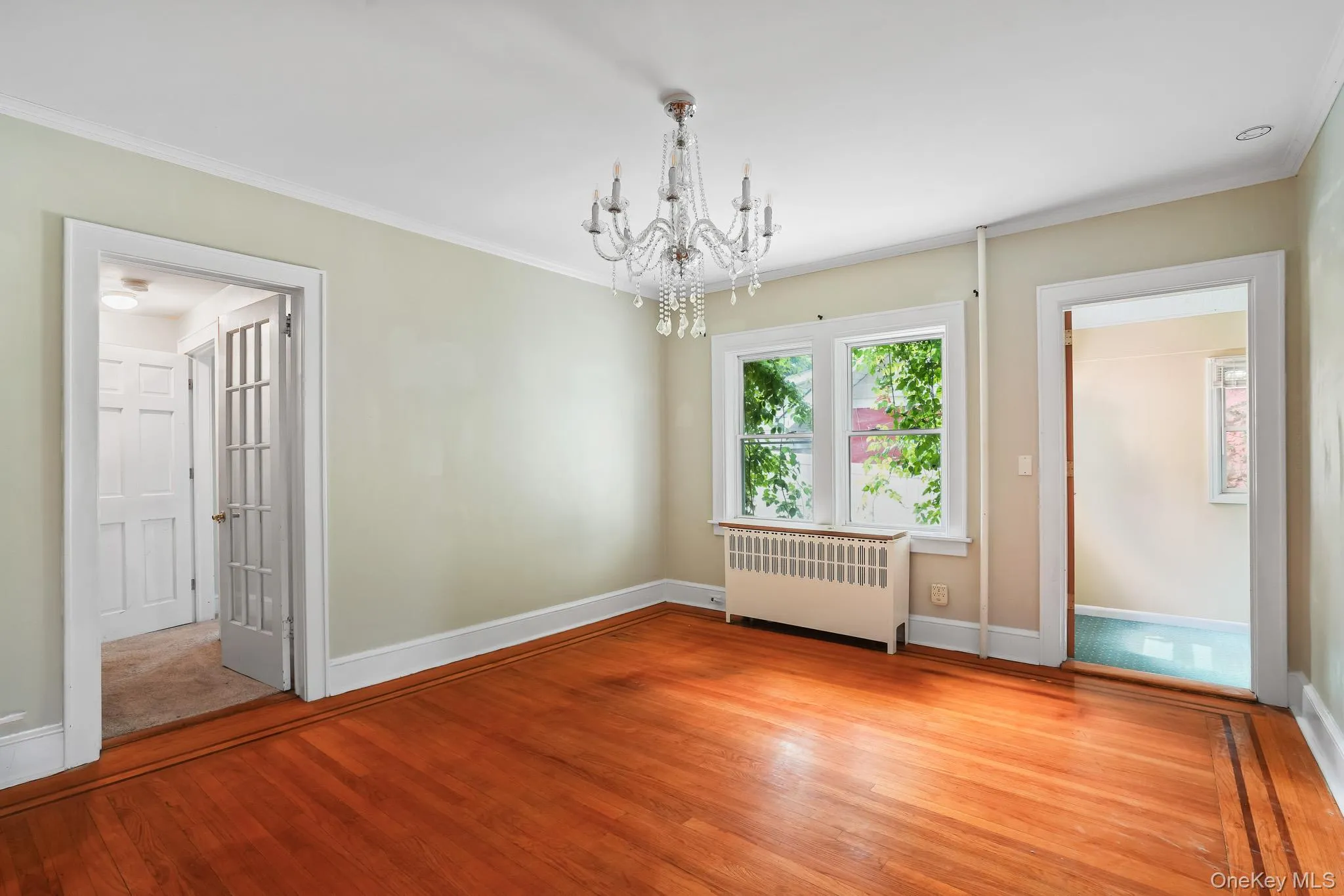 Original inlaid hardwood floors and chandelier Original inlaid hardwood floors and chandelier