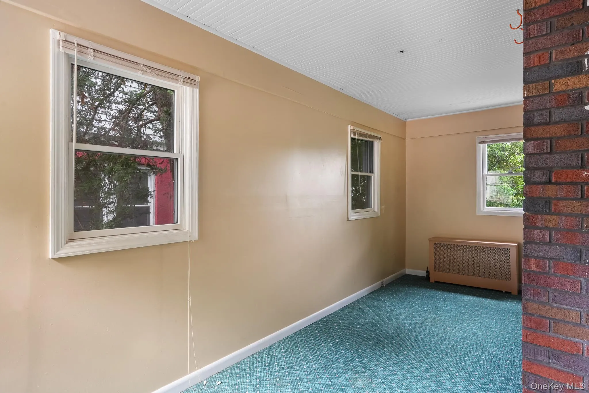 Bonus room behind living room accessible from dining room Bonus room behind living room accessible from dining room