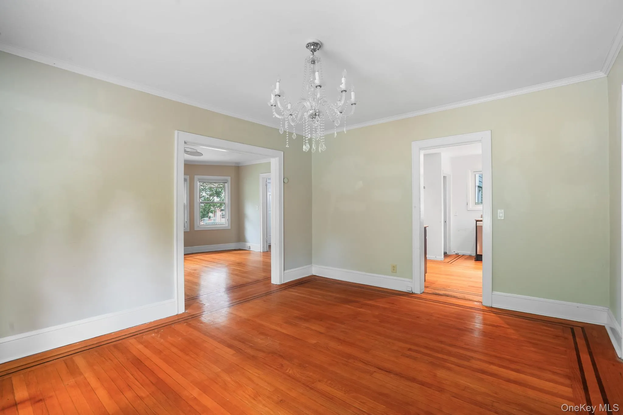 Original inlaid hardwood floors and chandelier Original inlaid hardwood floors and chandelier