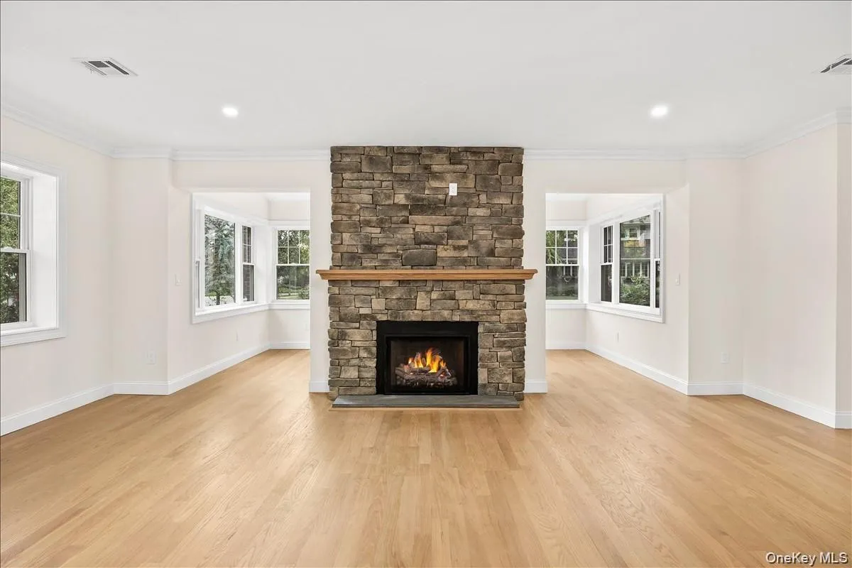 fireplace facing the entry into the sunroom fireplace facing the entry into the sunroom