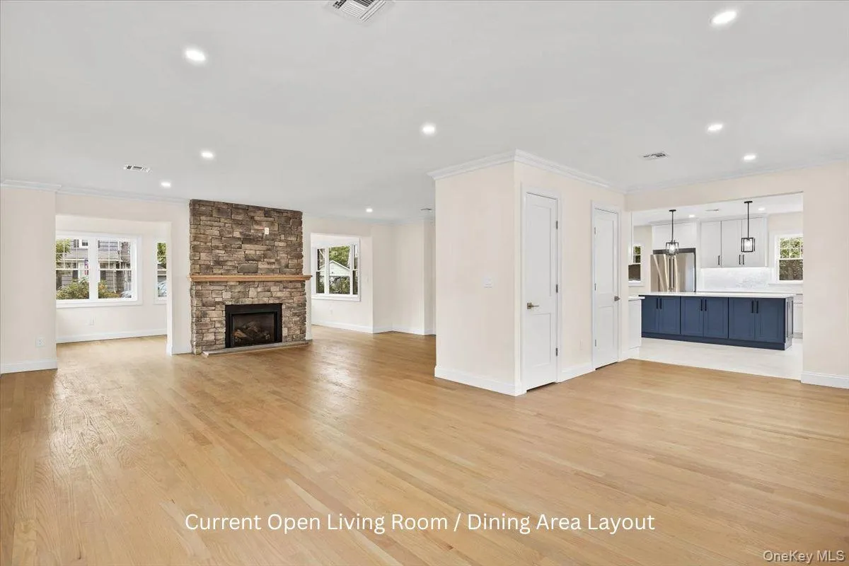 Current layout of the open concept dining room/living room Current layout of the open concept dining room/living room