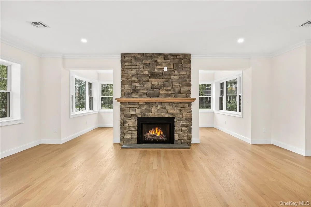fireplace facing the entry into the sunroom fireplace facing the entry into the sunroom