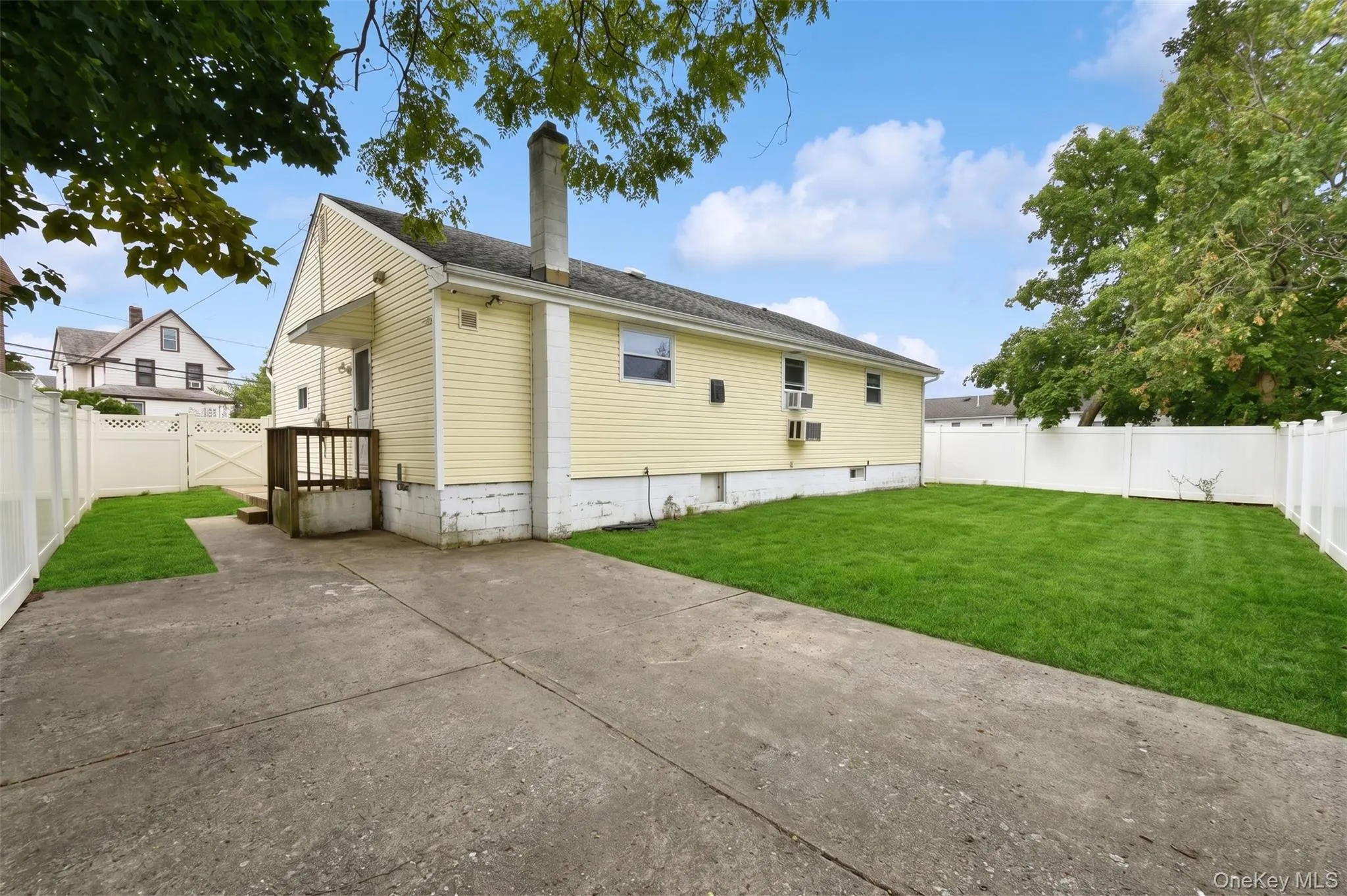 Fully fenced yard. Digitally enhanced grass Fully fenced yard. Digitally enhanced grass