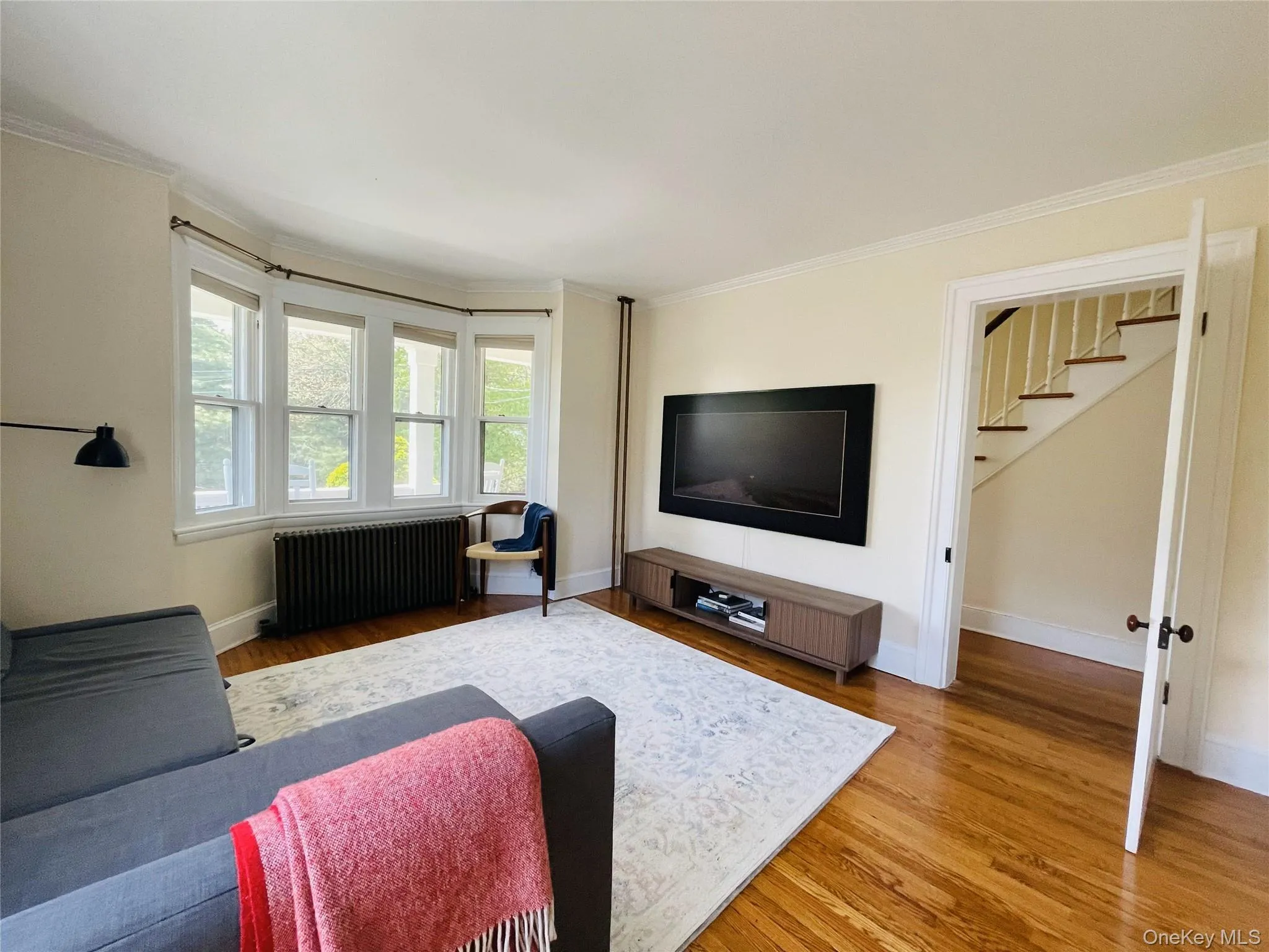 Living room featuring doors that close Living room featuring doors that close