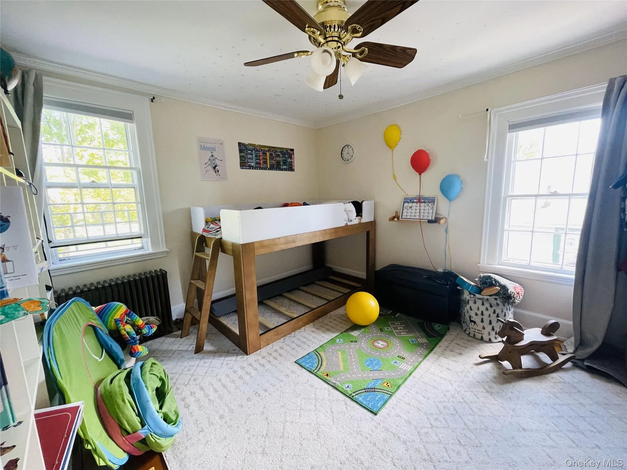 Bedroom with crown molding, and ceiling fan Bedroom with crown molding, and ceiling fan