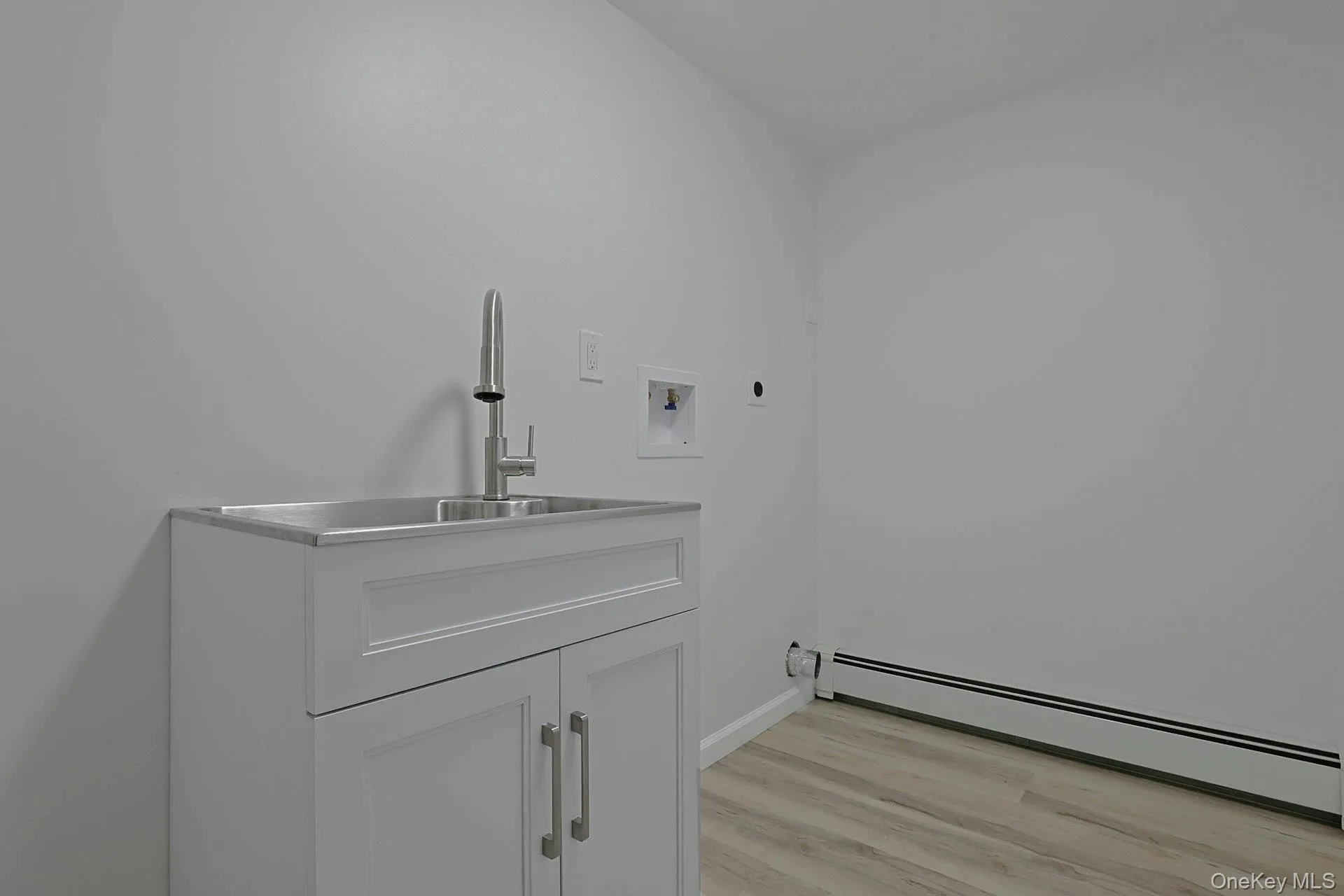 Sink with washer/dryer hookup Sink with washer/dryer hookup