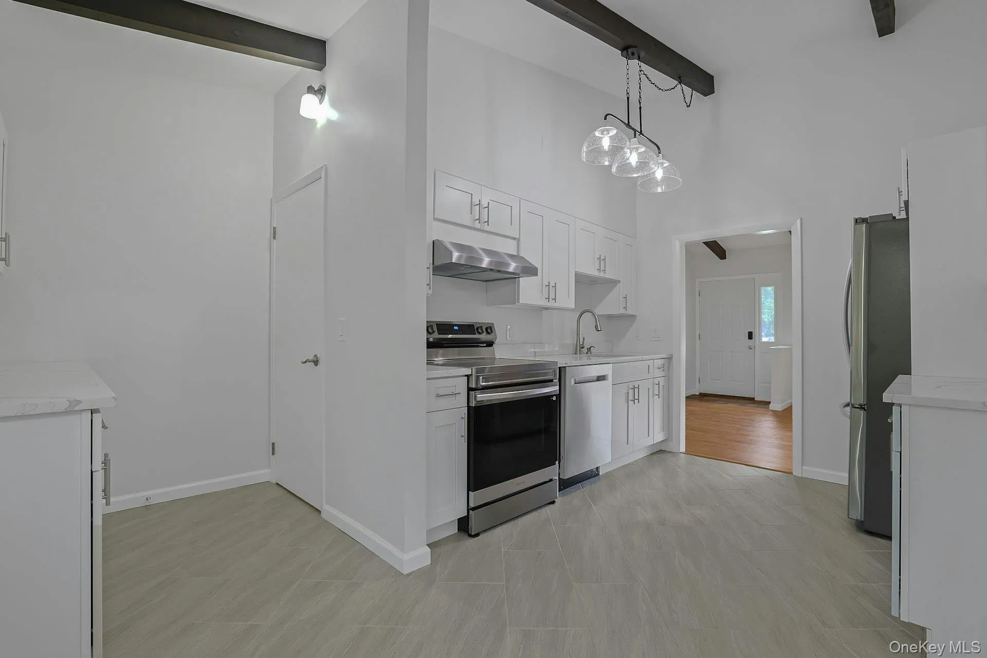 Eat in Kitchen with tile floors and beamed ceiling Eat in Kitchen with tile floors and beamed ceiling