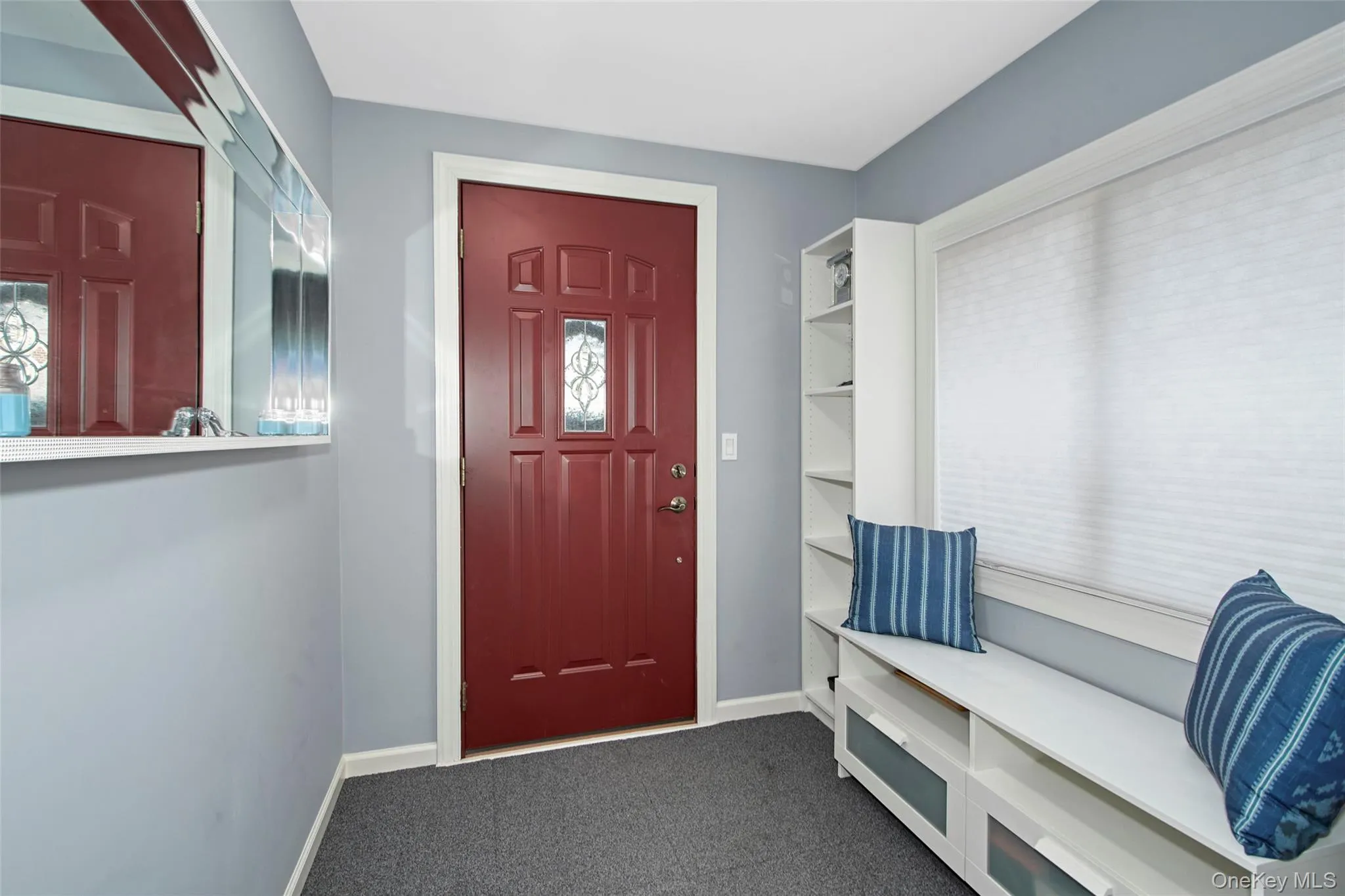 Enclosed foyer with built-ins Enclosed foyer with built-ins