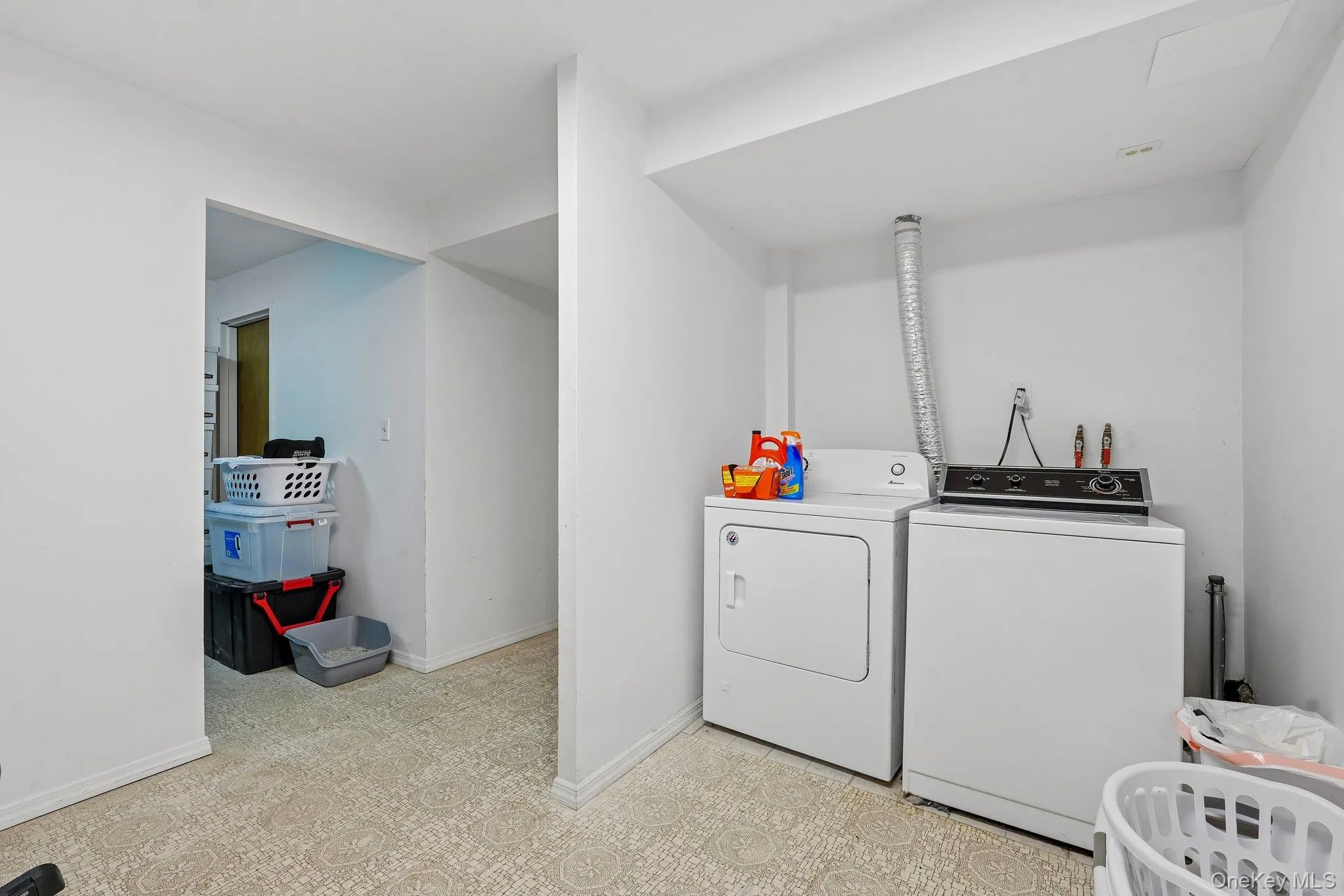 Bonus room for storage off the laundry room with additional space under the basement steps. Bonus room for storage off the laundry room with additional space under the basement steps.
