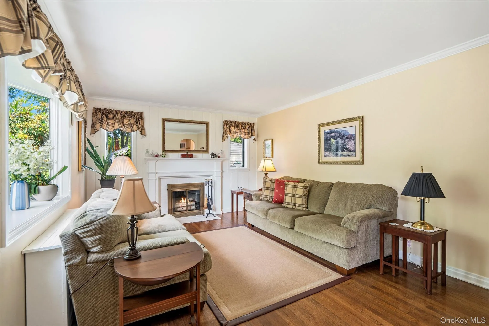Formal Living room with fireplace and solid oak hardwood floors Formal Living room with fireplace and solid oak hardwood floors