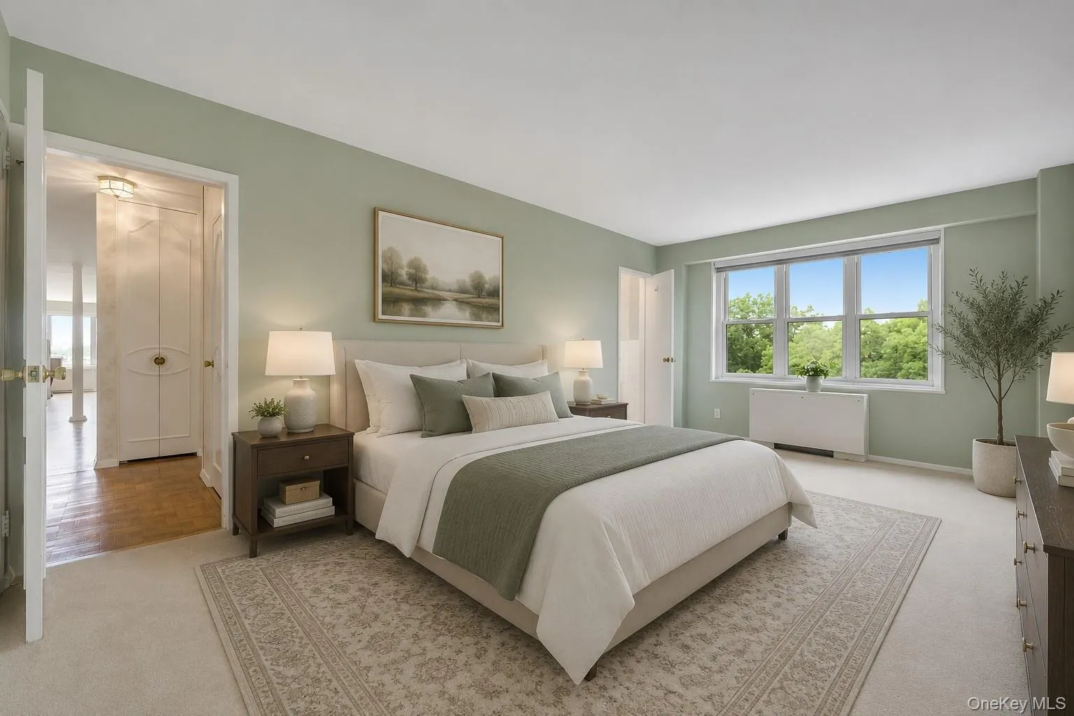 Generously sized primary suite with room for a king-sized bed and additional furnishings. There is an enormous walk-in closet and a very large double closet. Virtually staged. Generously sized primary suite with room for a king-sized bed and additional furnishings. There is an enormous walk-in closet and a very large double closet. Virtually staged.