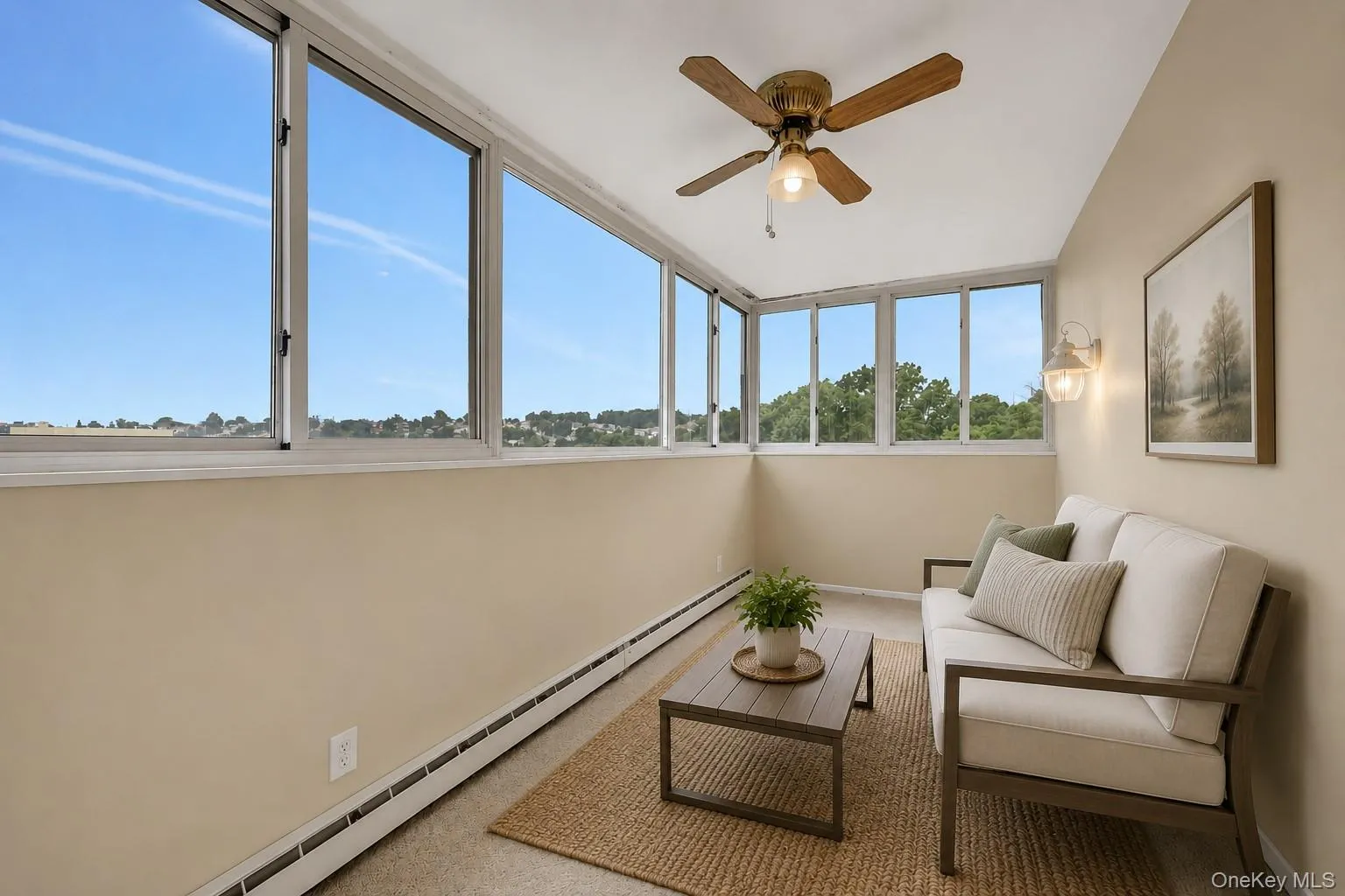 Light-filled enclosed sunroom offering panoramic views- the perfect spot to relax, read, or enjoy your morning coffee. Virtually staged. Light-filled enclosed sunroom offering panoramic views- the perfect spot to relax, read, or enjoy your morning coffee. Virtually staged.