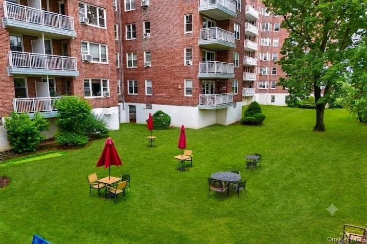Rarely found in a cooperative setting, the expansive, park-like rear courtyard offers sweeping lawns, mature trees, and a peaceful outdoor environment adjacent to the golf course. Rarely found in a cooperative setting, the expansive, park-like rear courtyard offers sweeping lawns, mature trees, and a peaceful outdoor environment adjacent to the golf course.