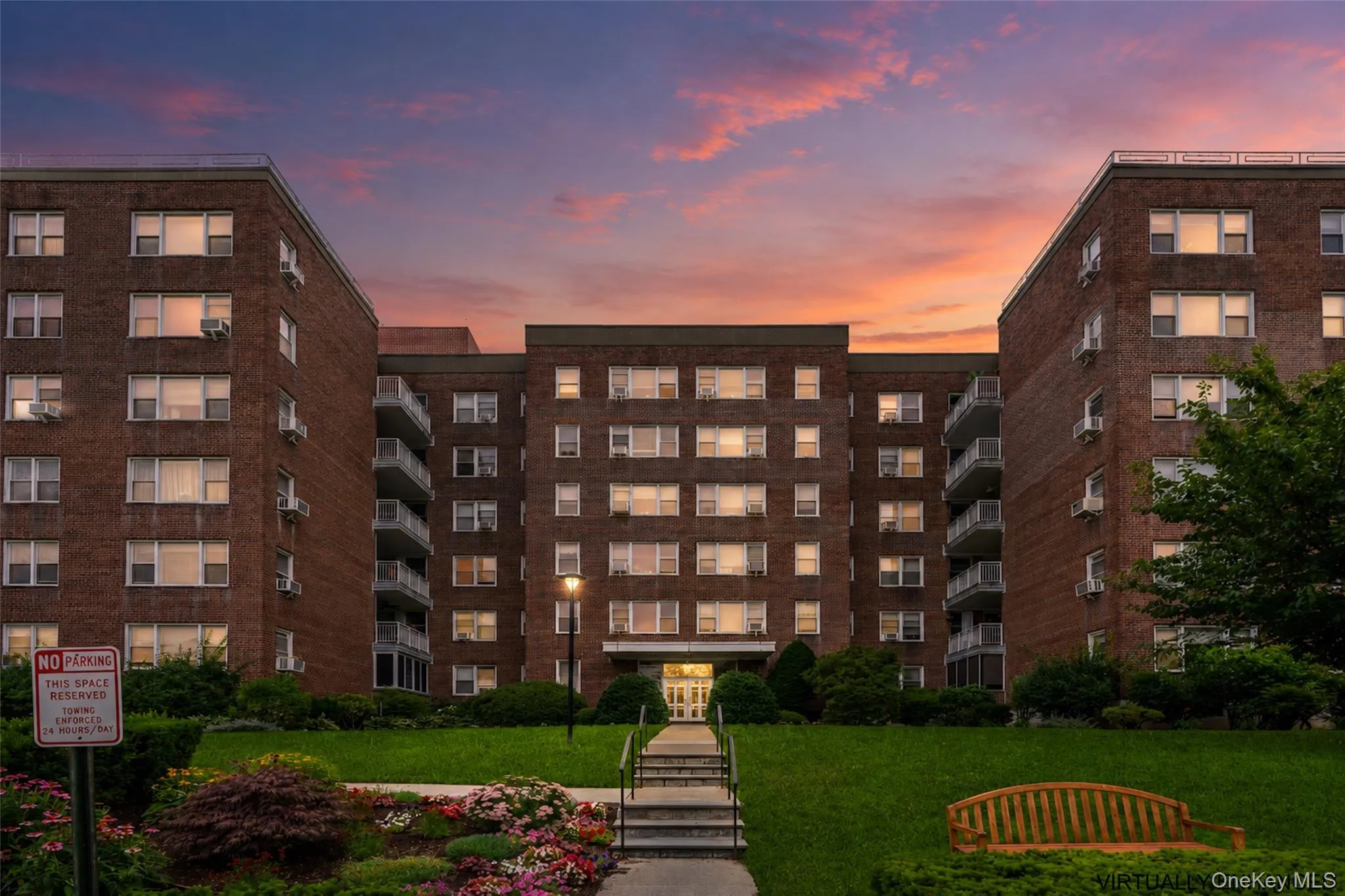 The classic brick facade takes on a warm glow as evening falls. The classic brick facade takes on a warm glow as evening falls.