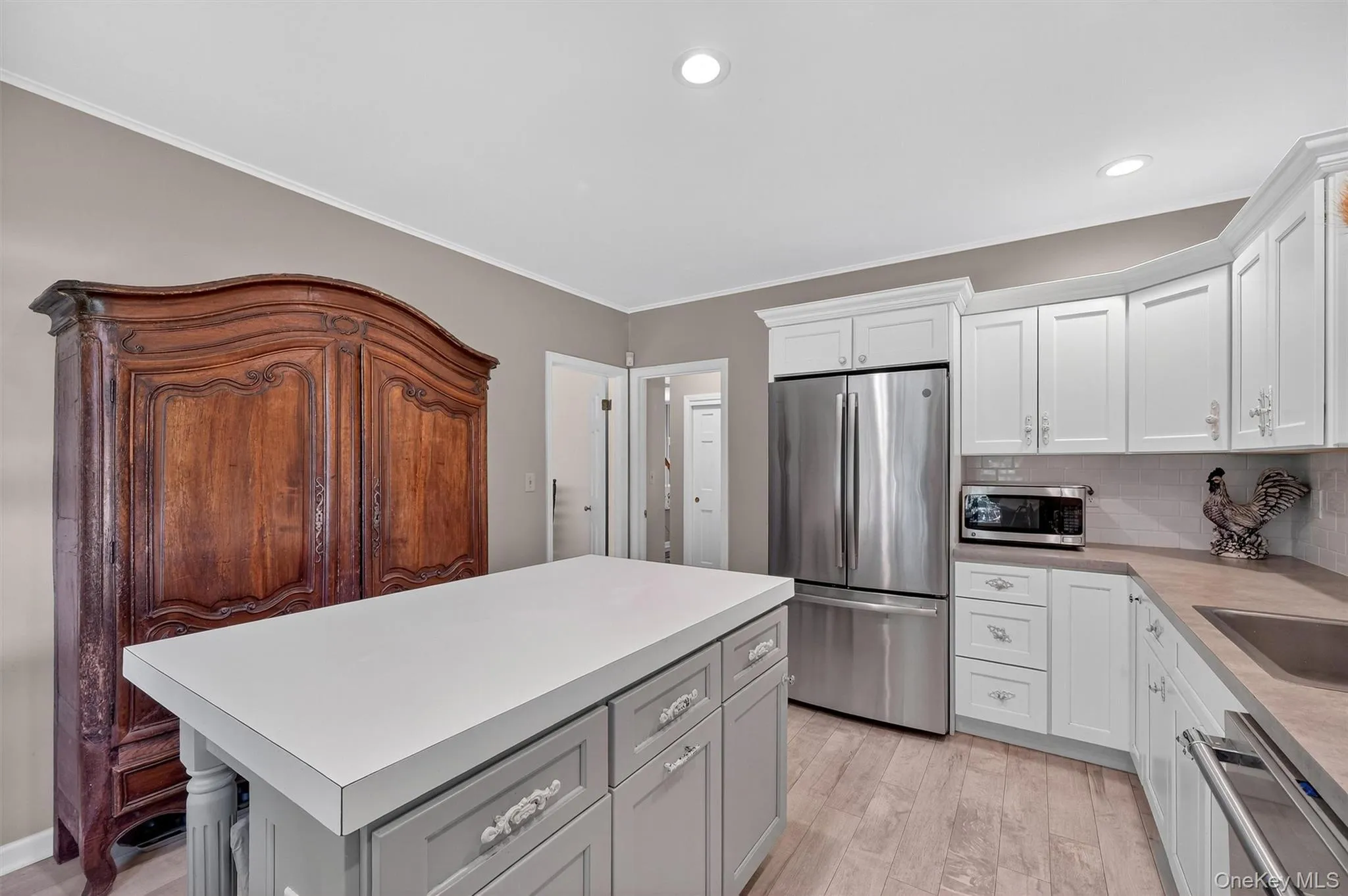 Updated kitchen with center island stainless steel appliances Updated kitchen with center island stainless steel appliances