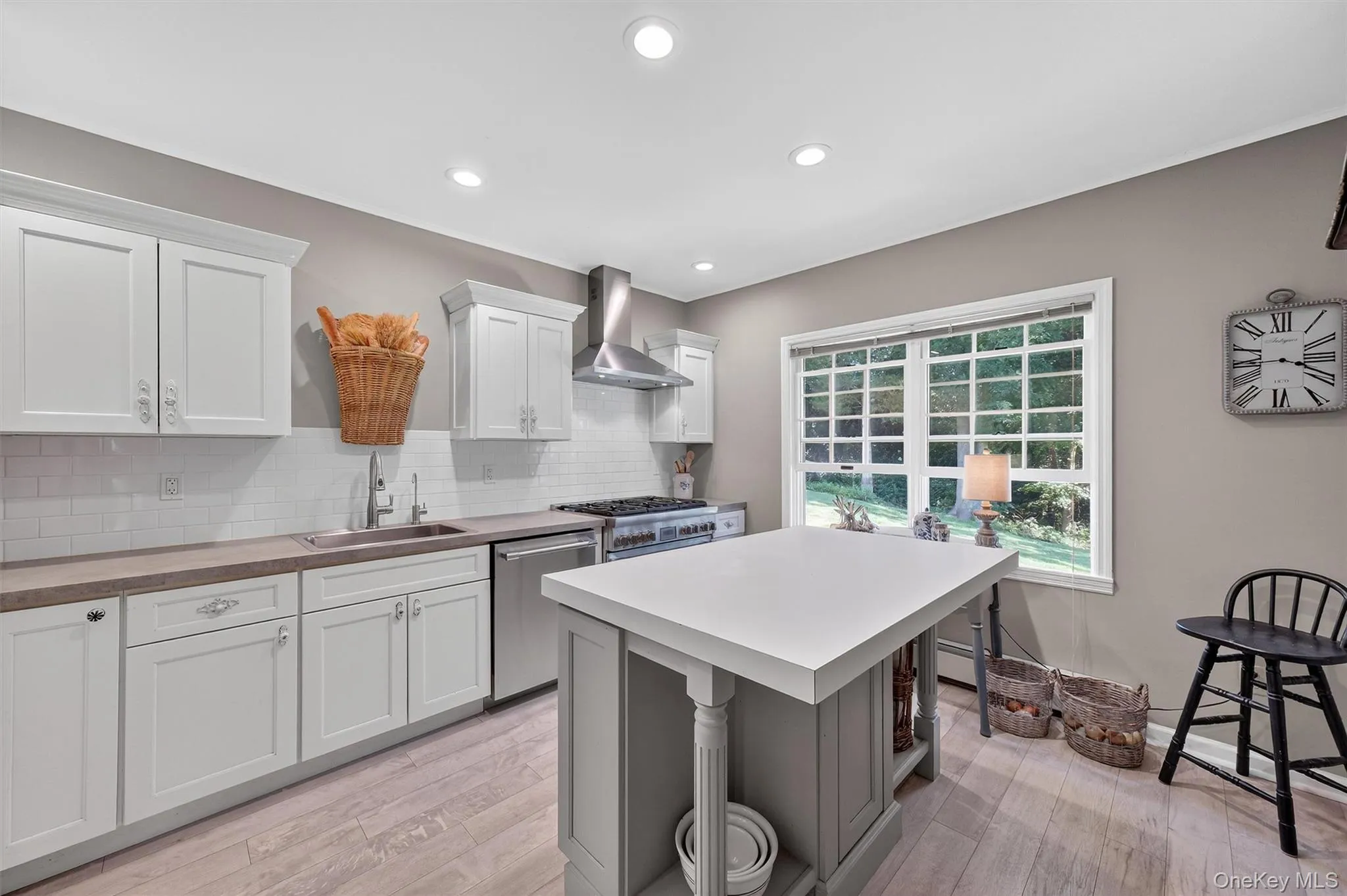 Updated kitchen with center island stainless steel appliances Updated kitchen with center island stainless steel appliances