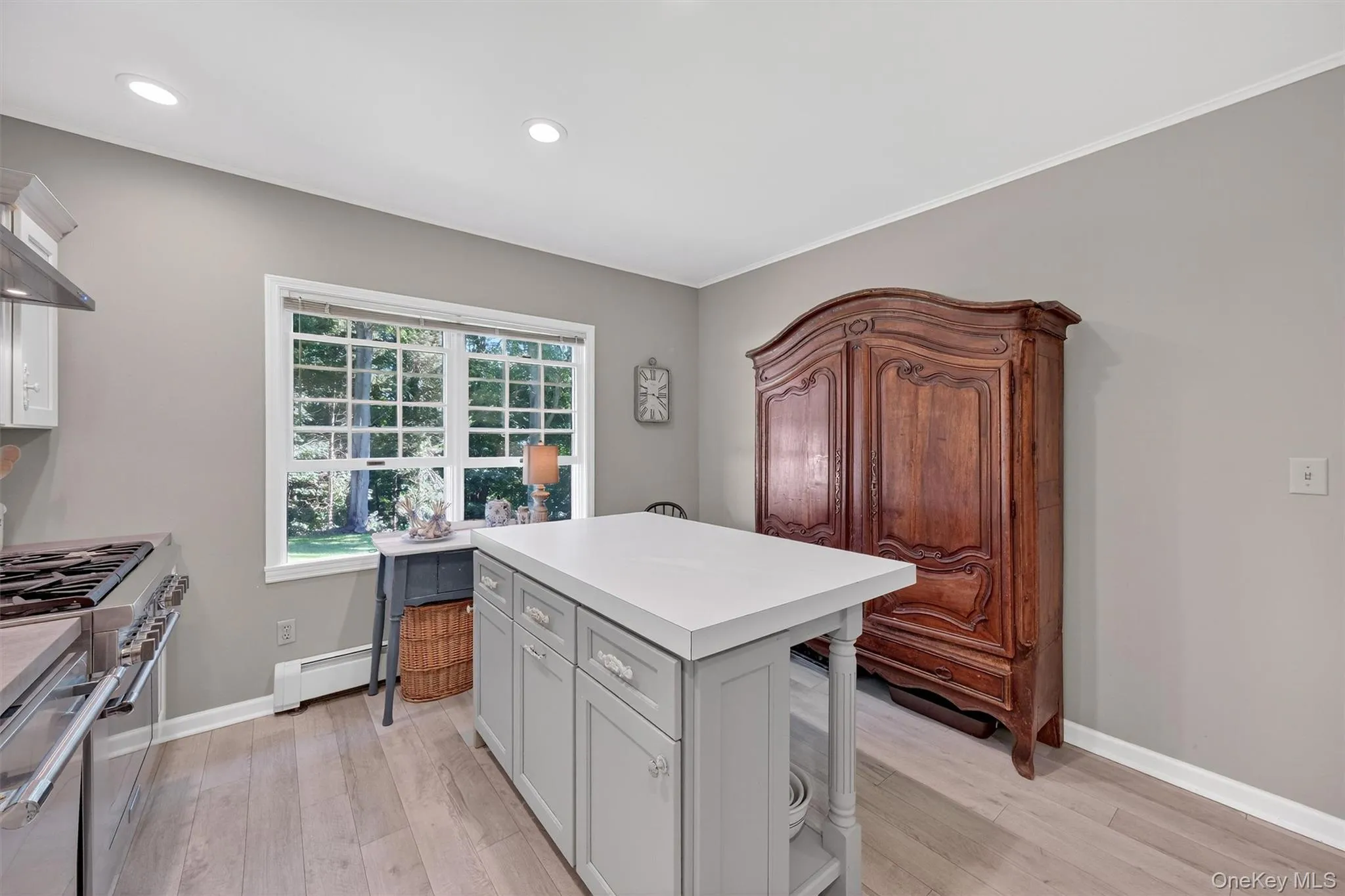 Updated kitchen with center island stainless steel appliances Updated kitchen with center island stainless steel appliances