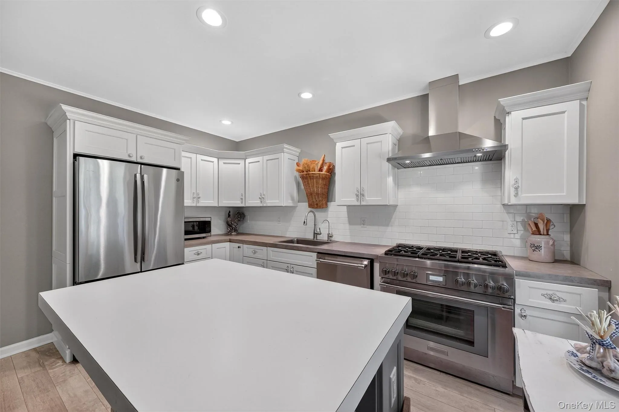 Updated kitchen with center island stainless steel appliances Updated kitchen with center island stainless steel appliances
