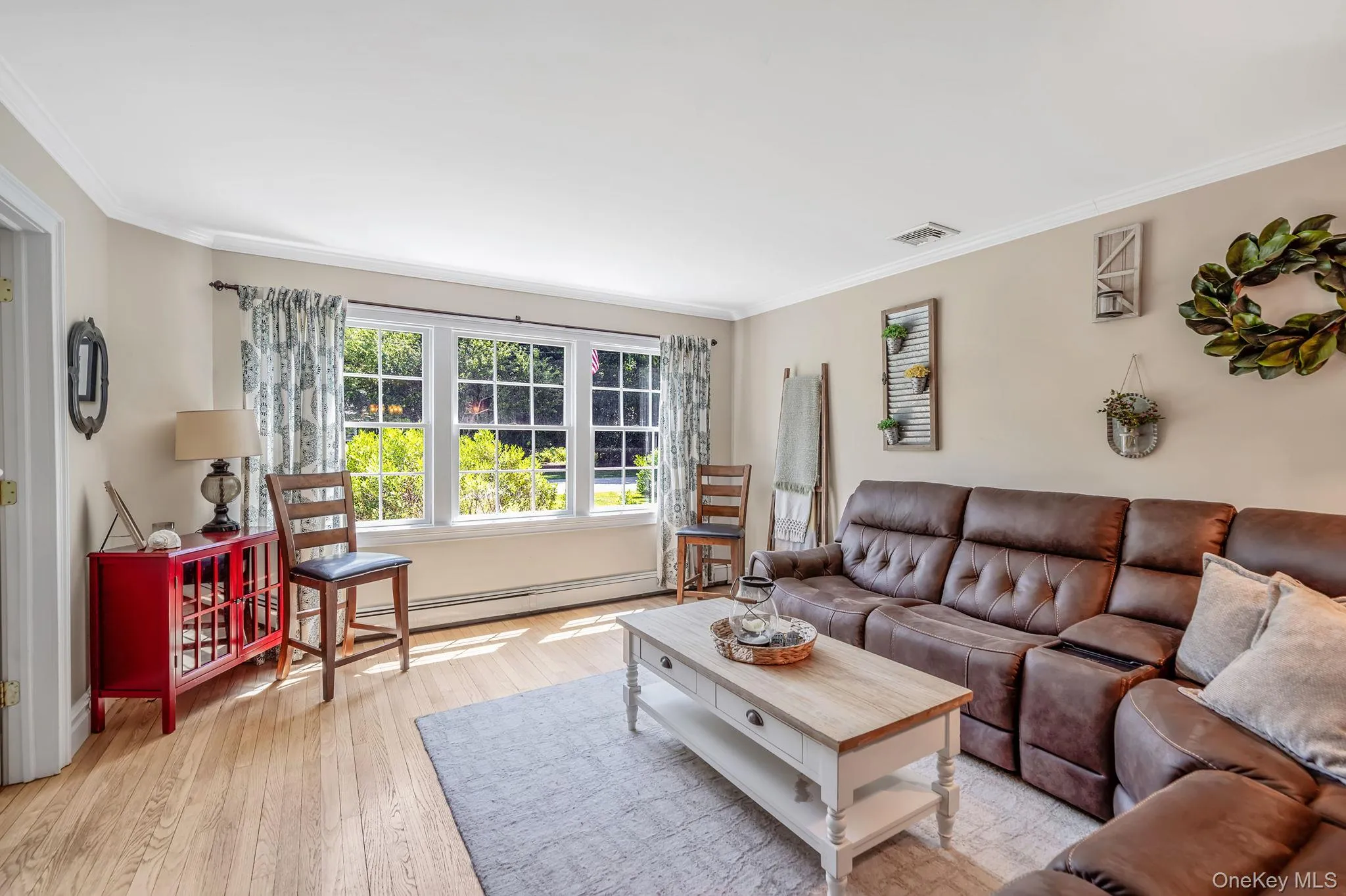Sunny Formal LR with HW Floors, Woodburning Fireplace, Open Flow to FDR and EIK Sunny Formal LR with HW Floors, Woodburning Fireplace, Open Flow to FDR and EIK