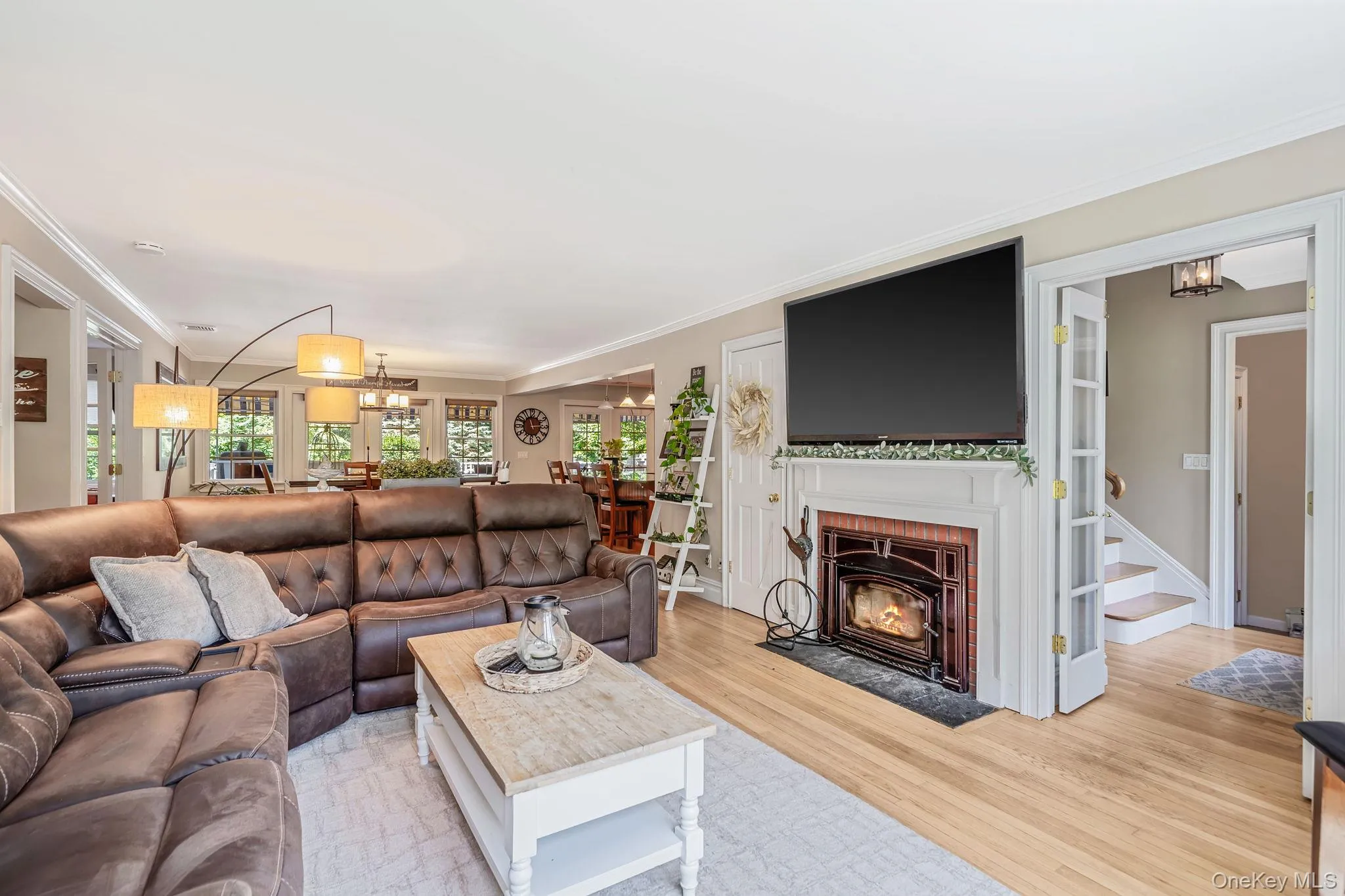 Sunny Formal LR with HW Floors, Woodburning Fireplace, Open Flow to FDR and EIK Sunny Formal LR with HW Floors, Woodburning Fireplace, Open Flow to FDR and EIK