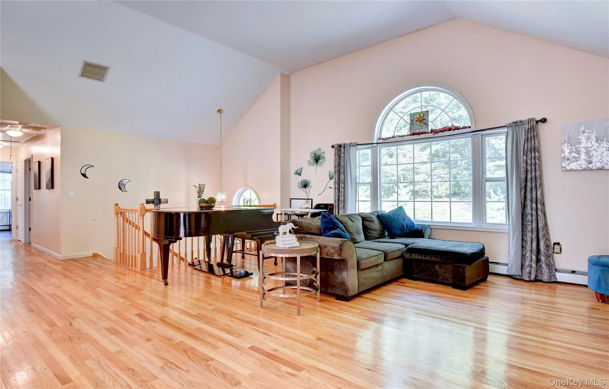 Hardwood flooring in the living room, dining room and kitchen Hardwood flooring in the living room, dining room and kitchen