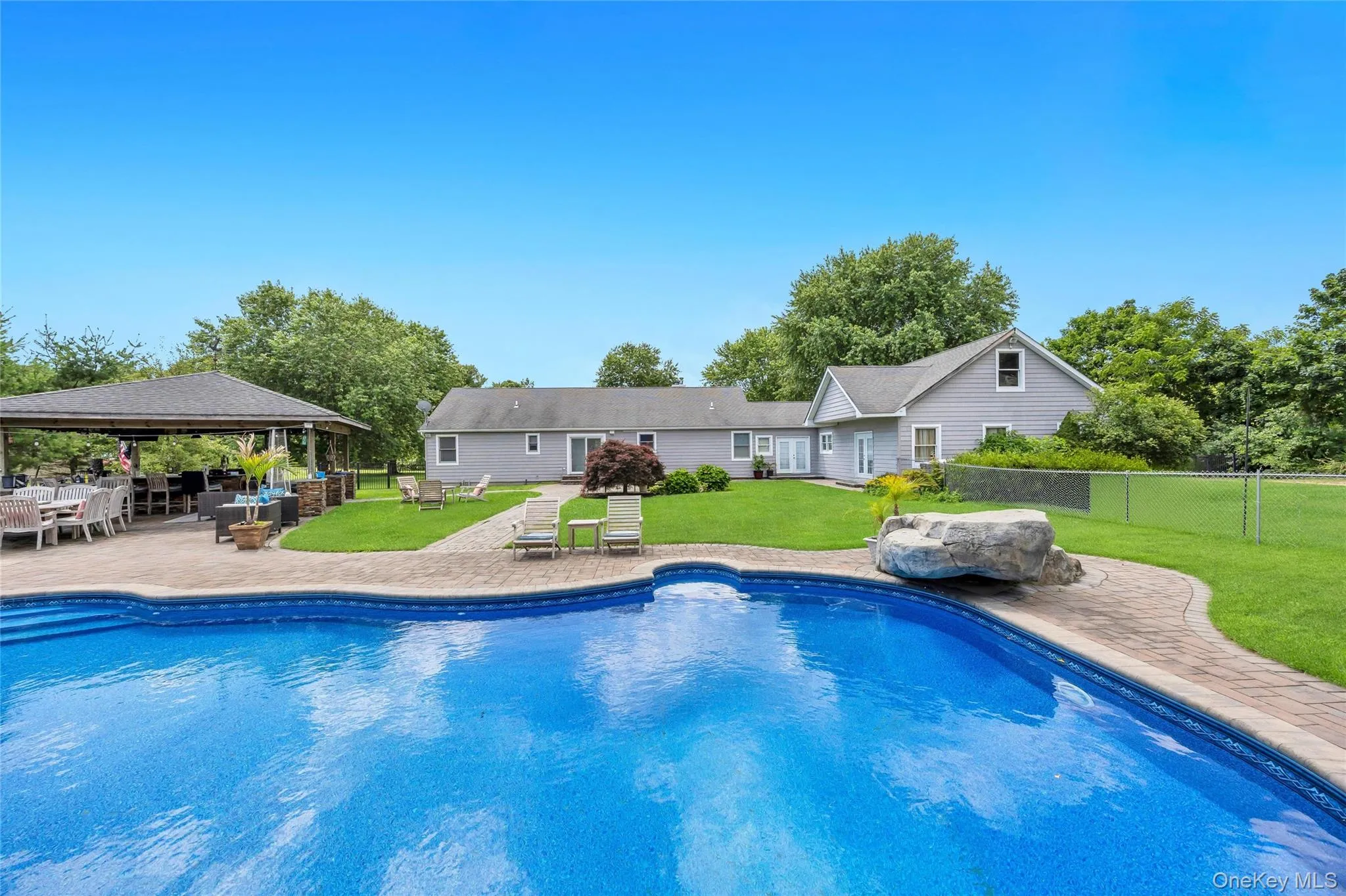 In Ground Pool Looking at Back of Home In Ground Pool Looking at Back of Home