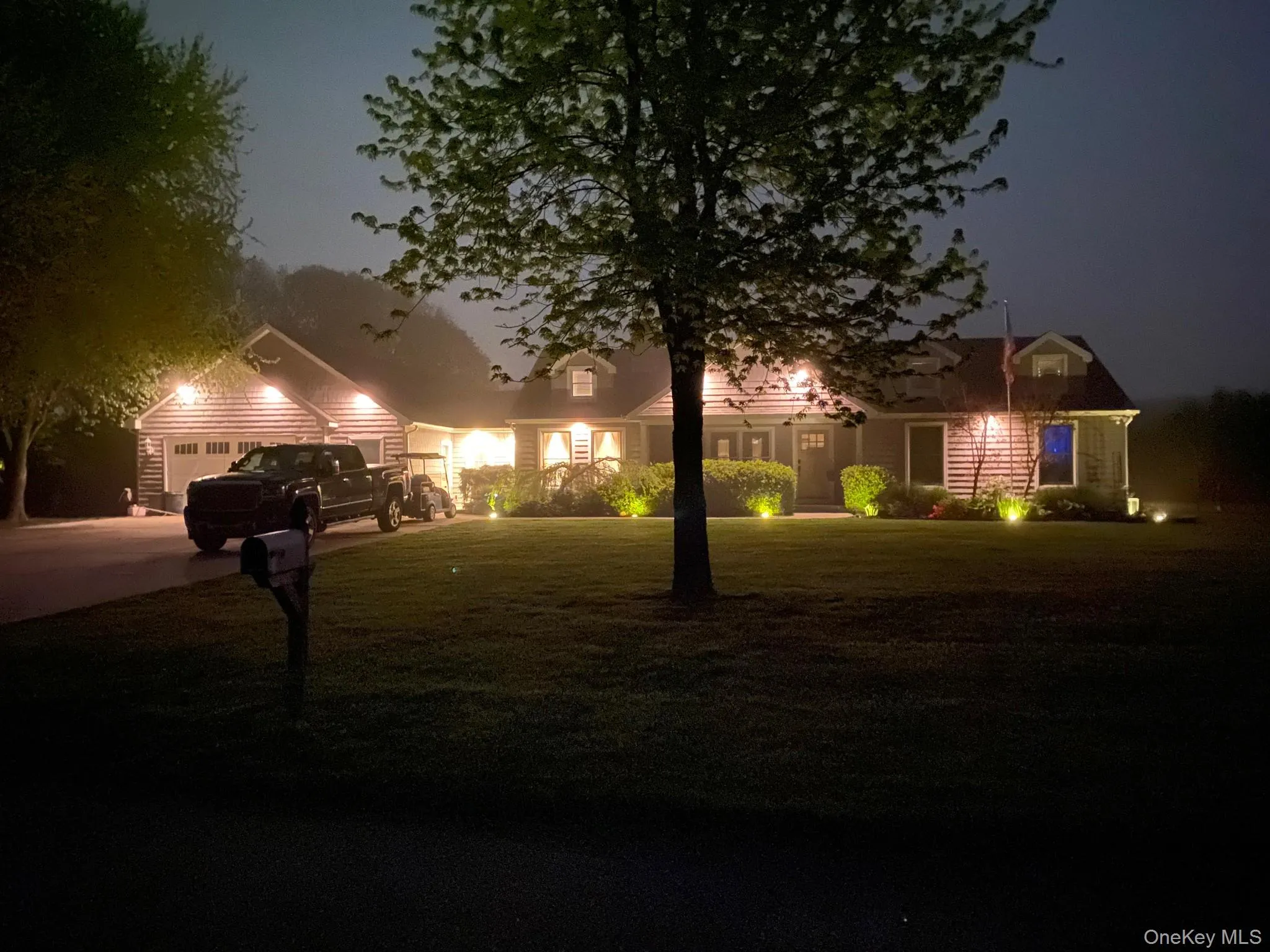 Front of Home Lit up at night Front of Home Lit up at night