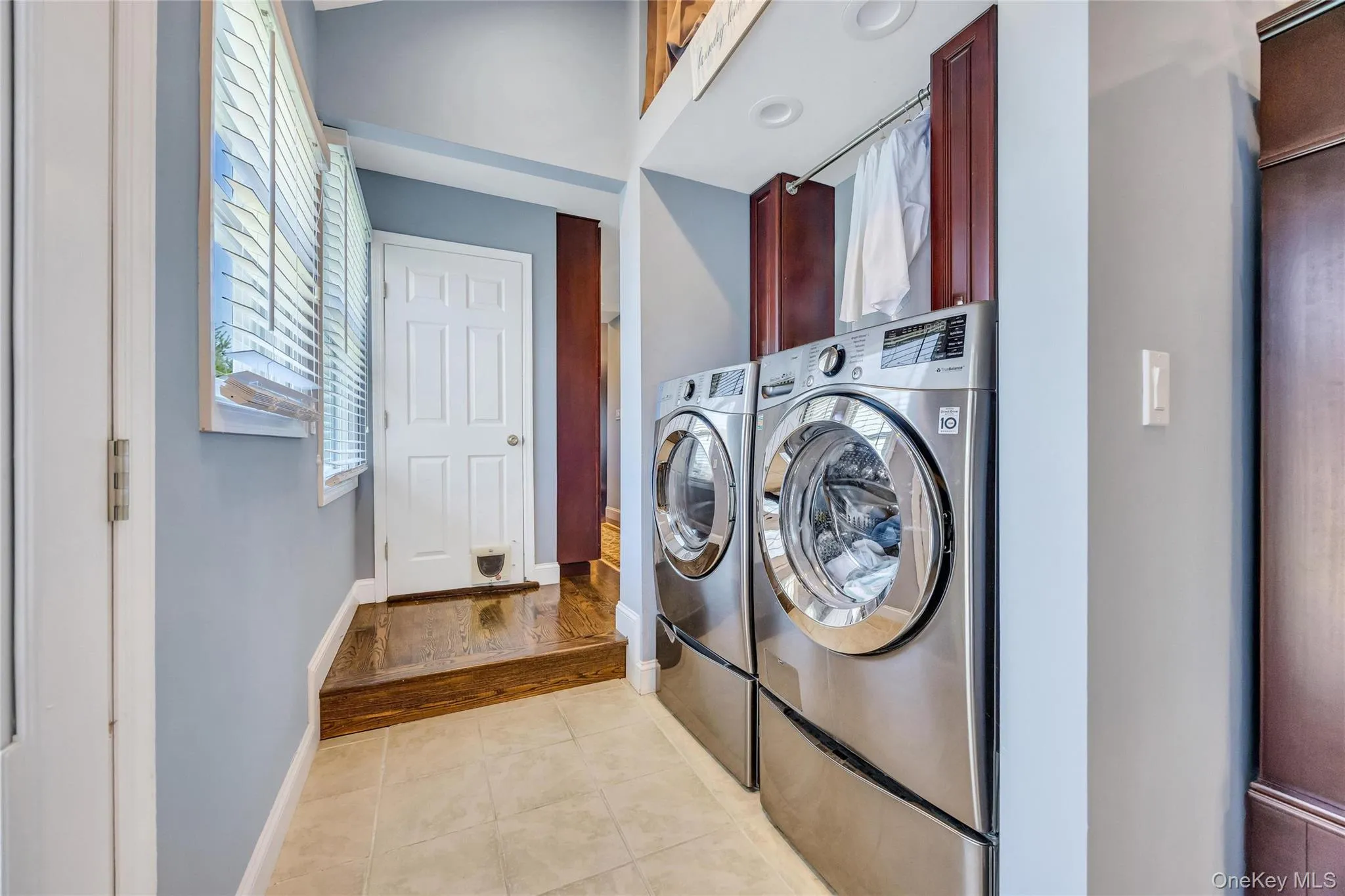 Laundry Area w/Cabinets and Overhead Storage Laundry Area w/Cabinets and Overhead Storage