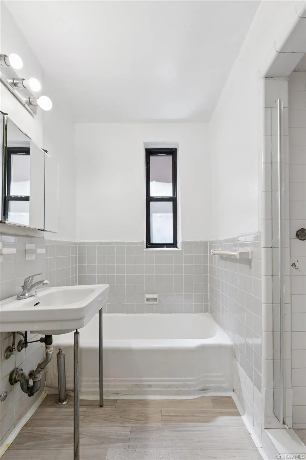 Windowed bath with tub/shower combination PLUS a separate stall shower Windowed bath with tub/shower combination PLUS a separate stall shower