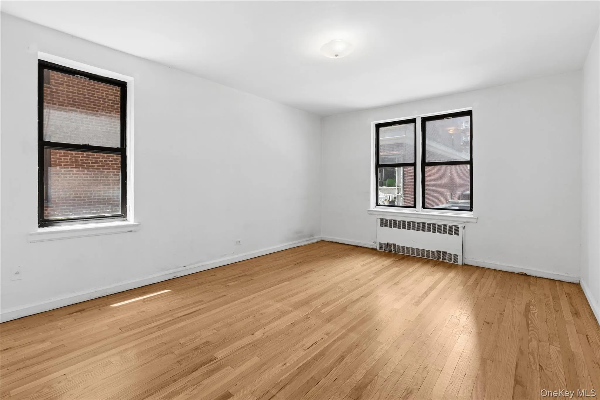 King sized primary bedroom with double closets King sized primary bedroom with double closets
