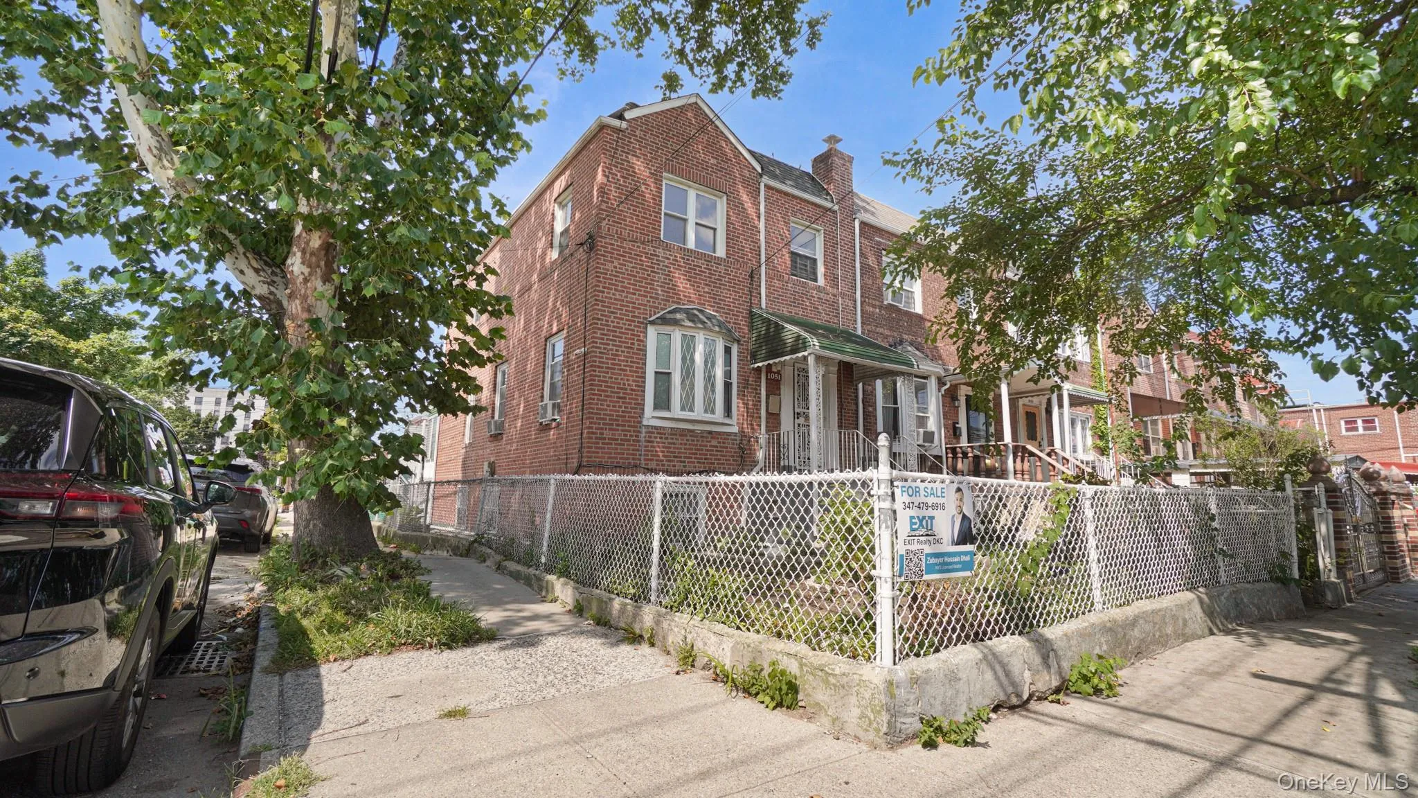 Brick exterior featuring multiple windows, a bay window, and a covered front entry Brick exterior featuring multiple windows, a bay window, and a covered front entry