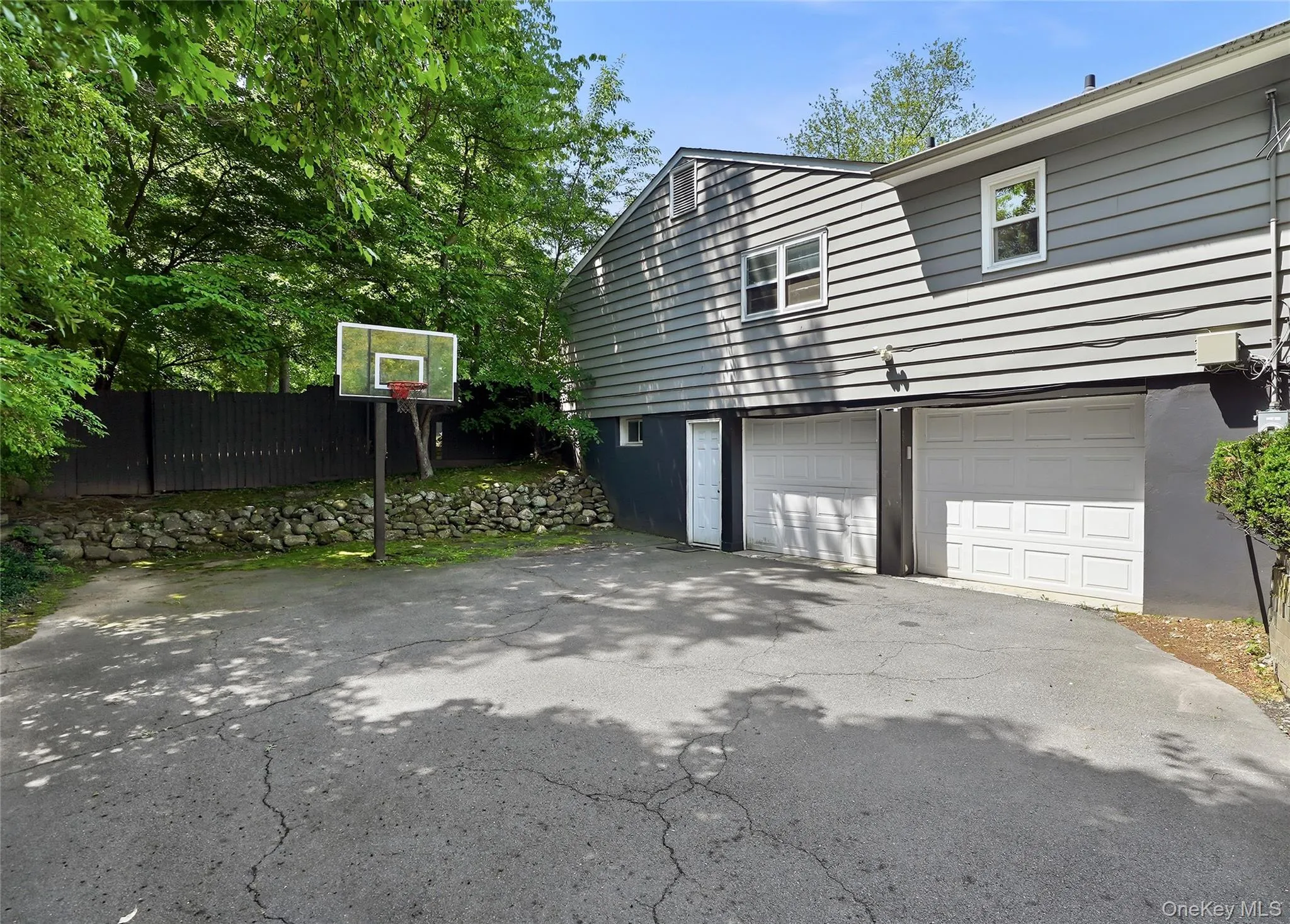 Driveway with basketball hoop Driveway with basketball hoop