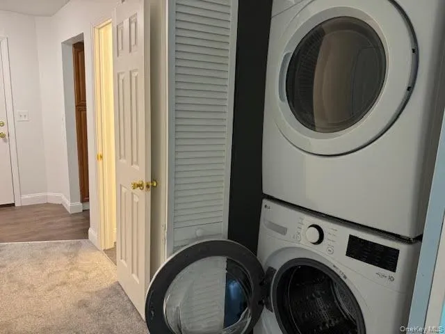 Featuring stacked washer / dryer. Featuring stacked washer / dryer.