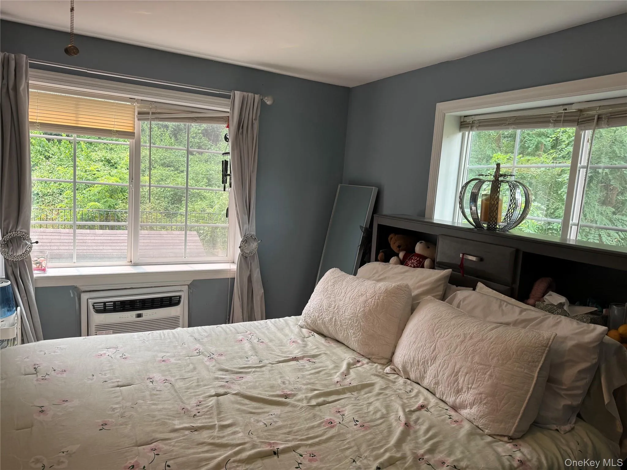 Expansive window framing verdant outdoor scenery Expansive window framing verdant outdoor scenery