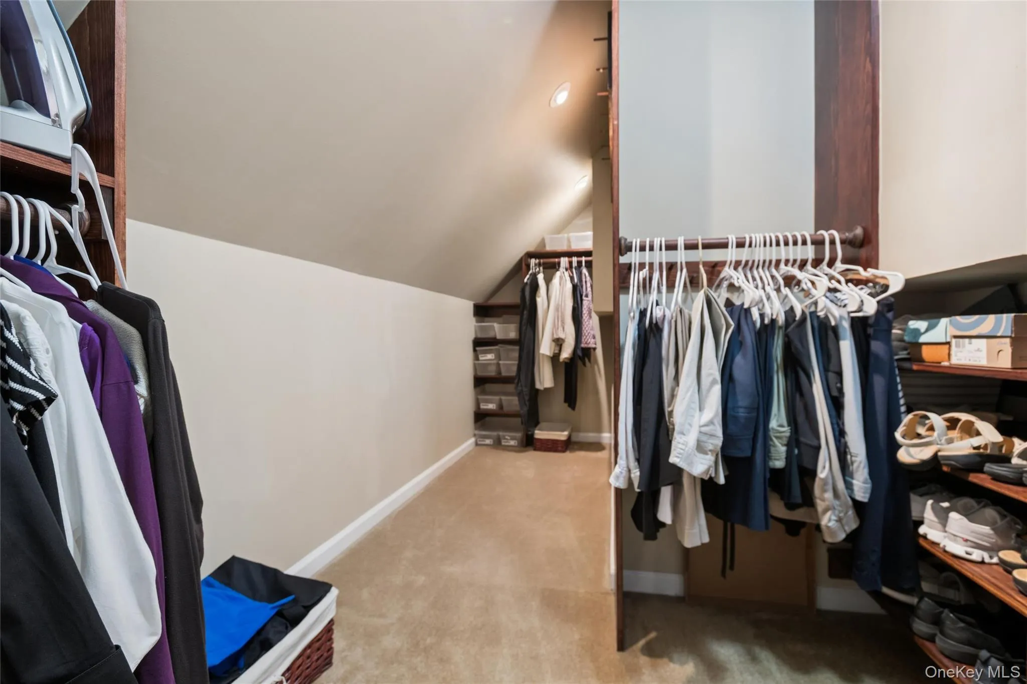 and Hers Walk-In Closet and Hers Walk-In Closet