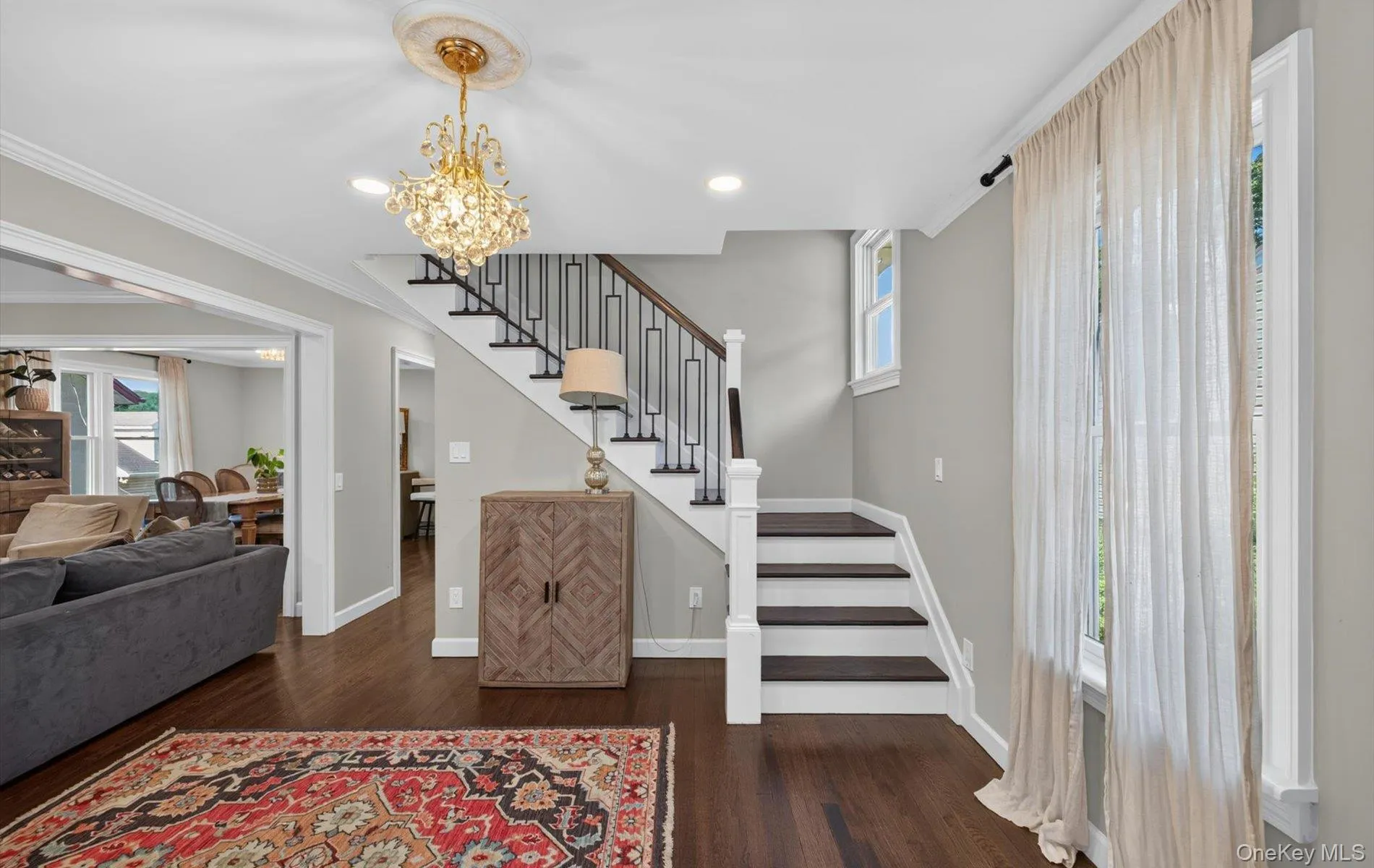 Beautiful Entry showing New Staircase, and entering Formal Living room Beautiful Entry showing New Staircase, and entering Formal Living room