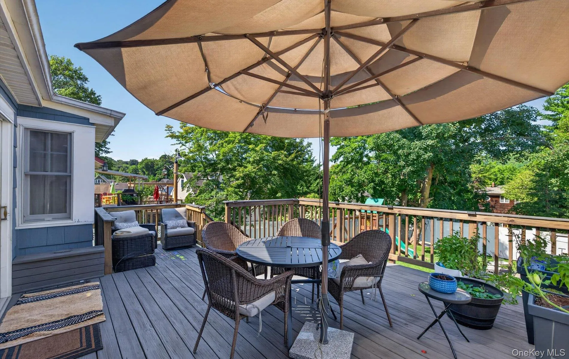 Expansive elevated deck natural wood railings Expansive elevated deck natural wood railings