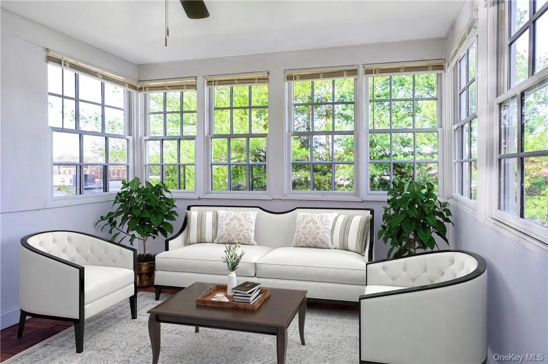 Virtually staged sunroom. Virtually staged sunroom.
