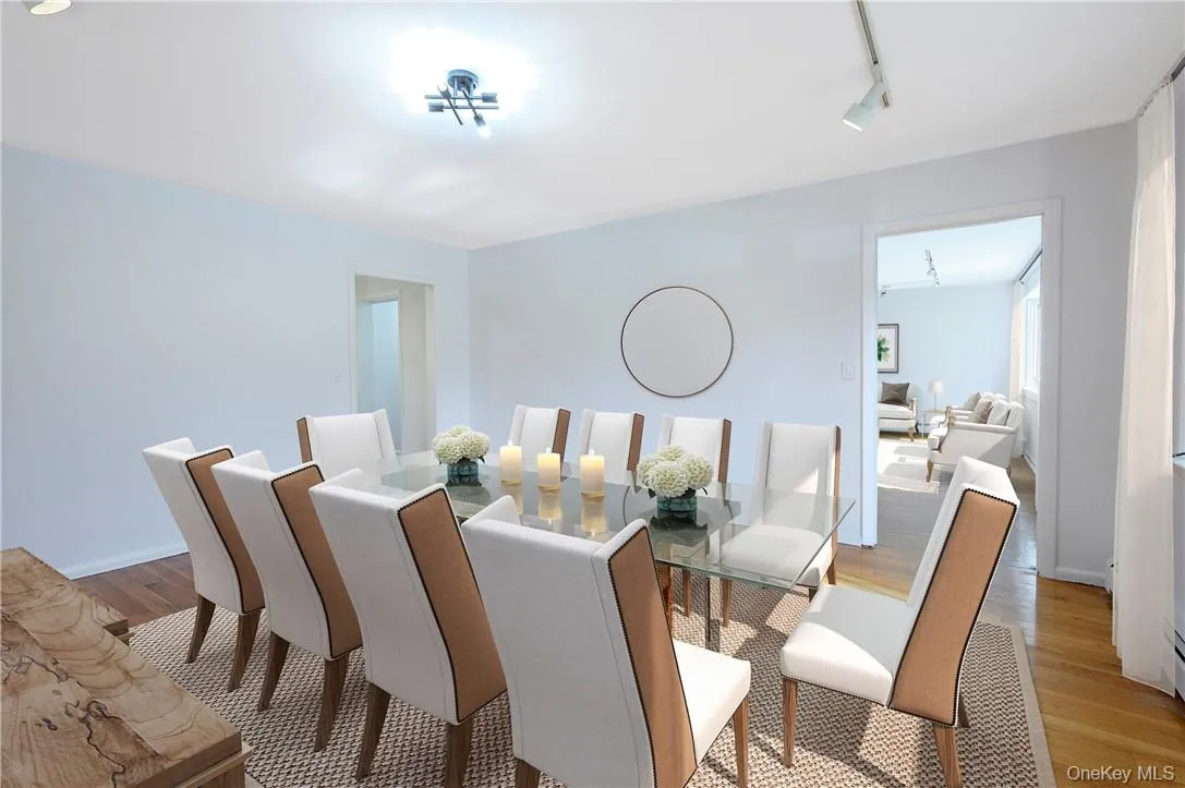 Virtually staged dining room. Virtually staged dining room.