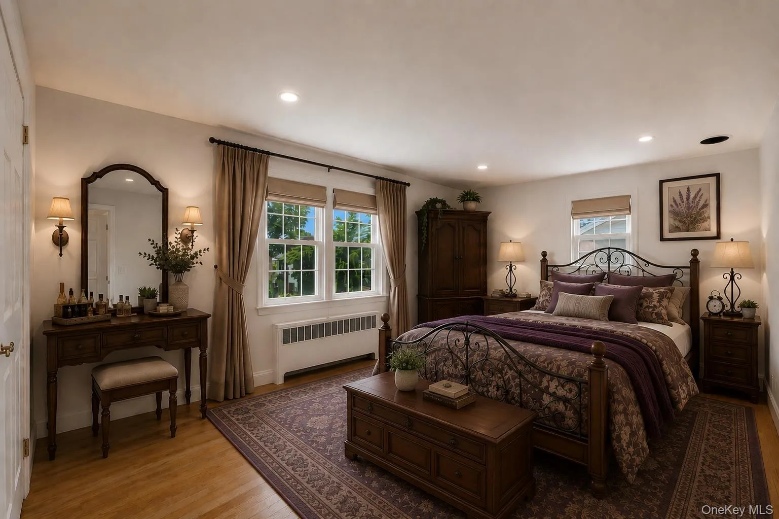 Primary bedroom featuring light wood-finish flooring, recessed lighting, and bright white walls Primary bedroom featuring light wood-finish flooring, recessed lighting, and bright white walls