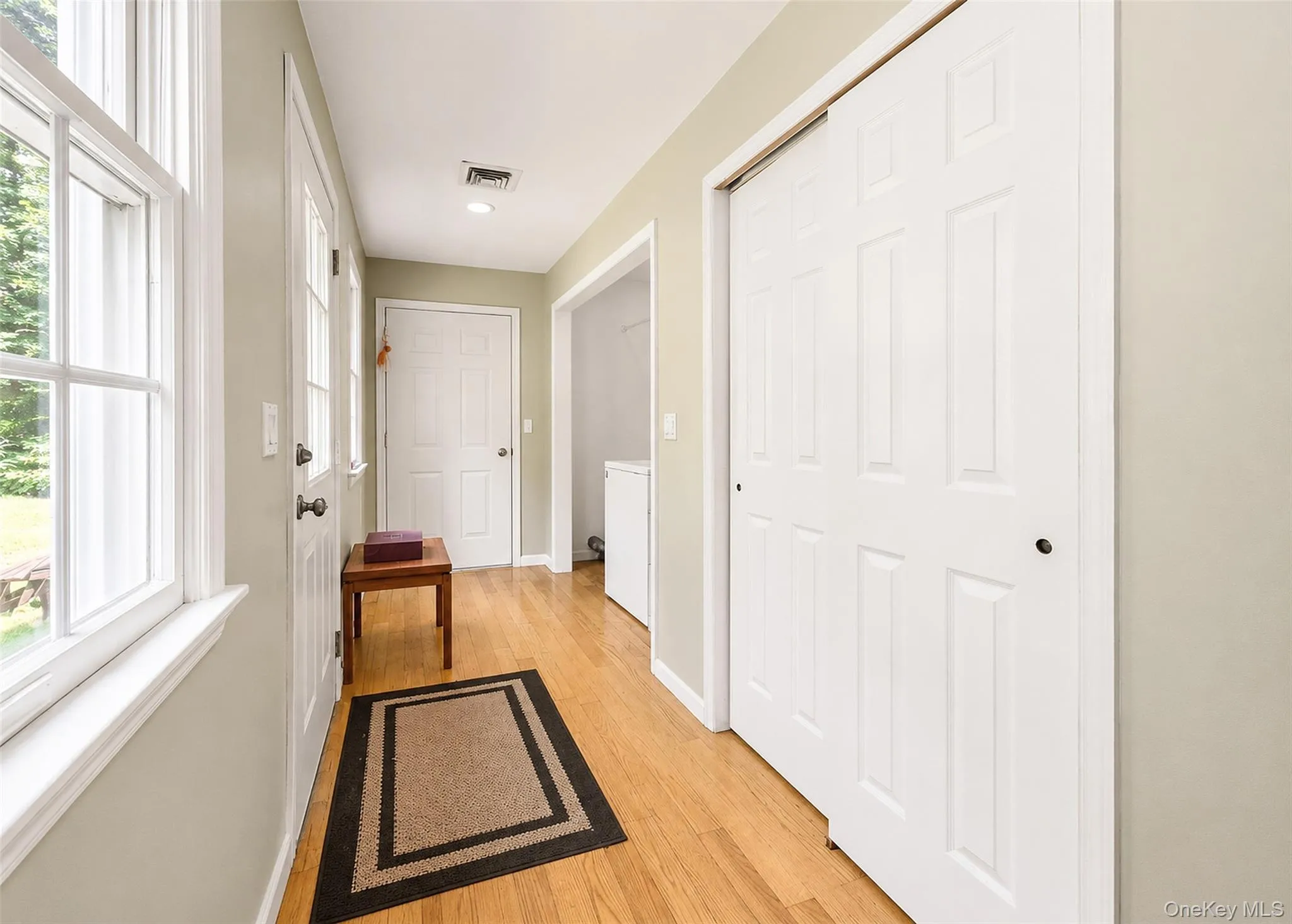 Hall off kitchen with closets and Laundry Hall off kitchen with closets and Laundry