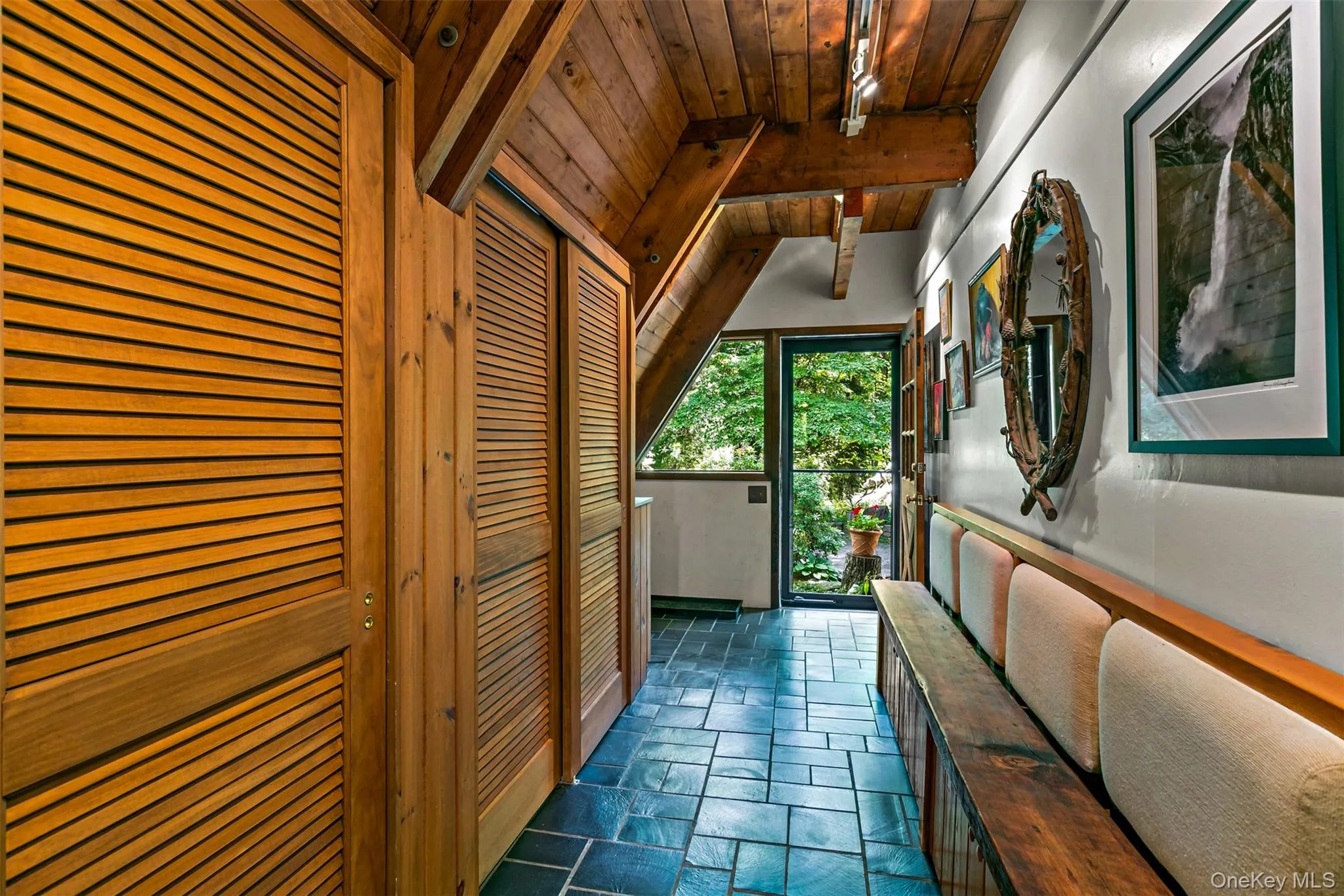 Expansive mud room with large amounts of storage. Expansive mud room with large amounts of storage.