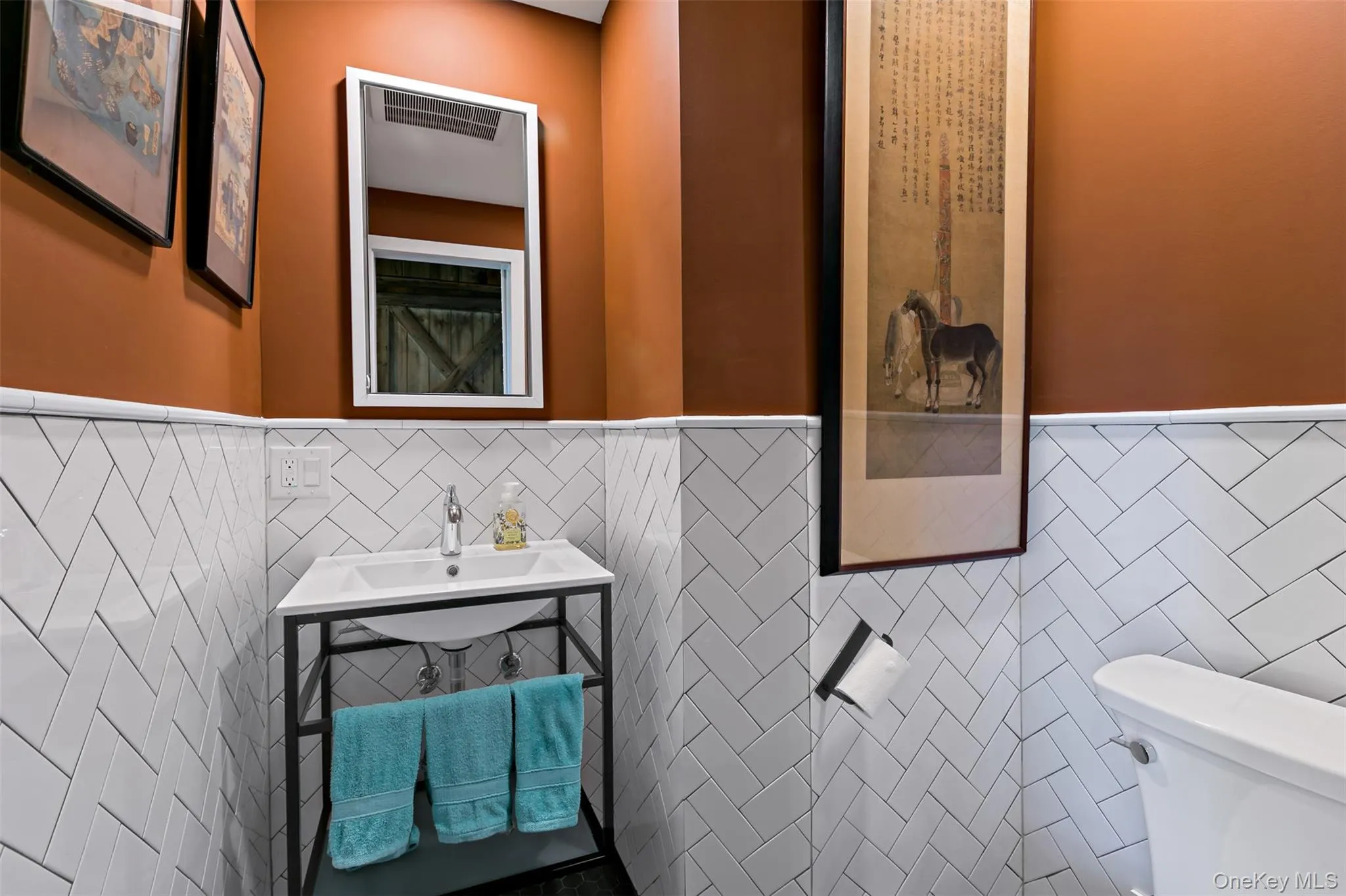 Powder room on the main level. Powder room on the main level.