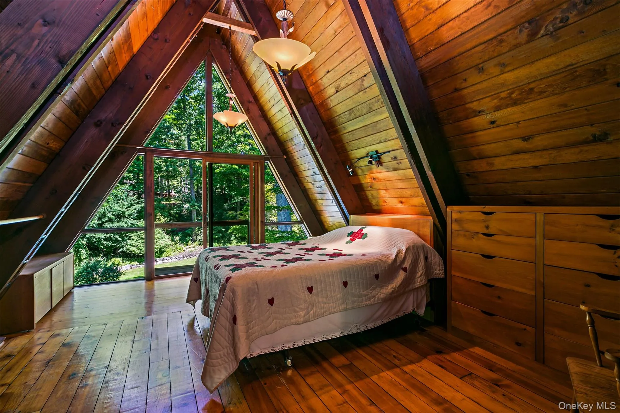 Primary bedroom with Juliet balcony overlooking the pool and grounds. Primary bedroom with Juliet balcony overlooking the pool and grounds.