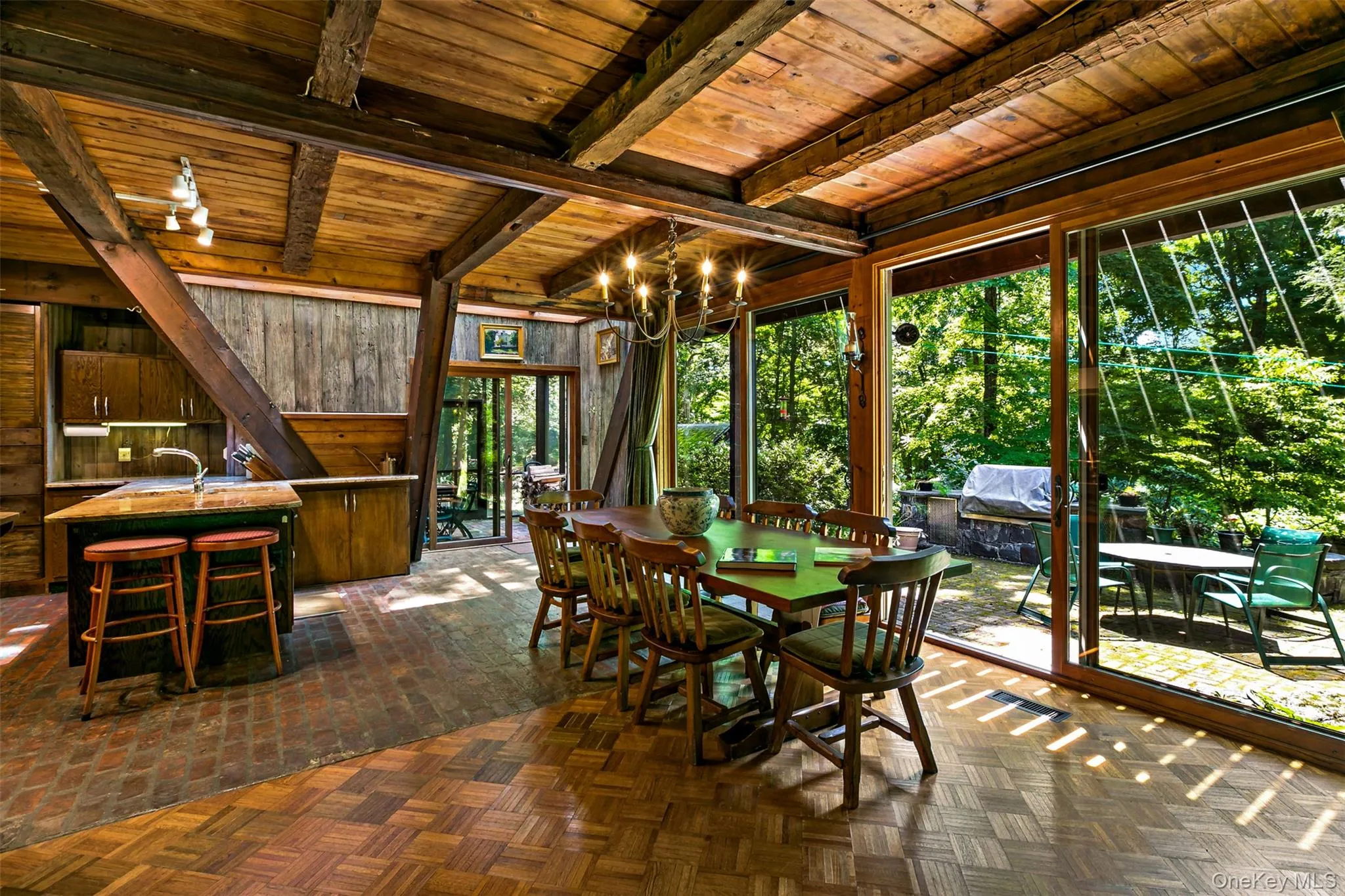 Formal dining room open to eat in kitchen, screened in porch, and terrace. Formal dining room open to eat in kitchen, screened in porch, and terrace.