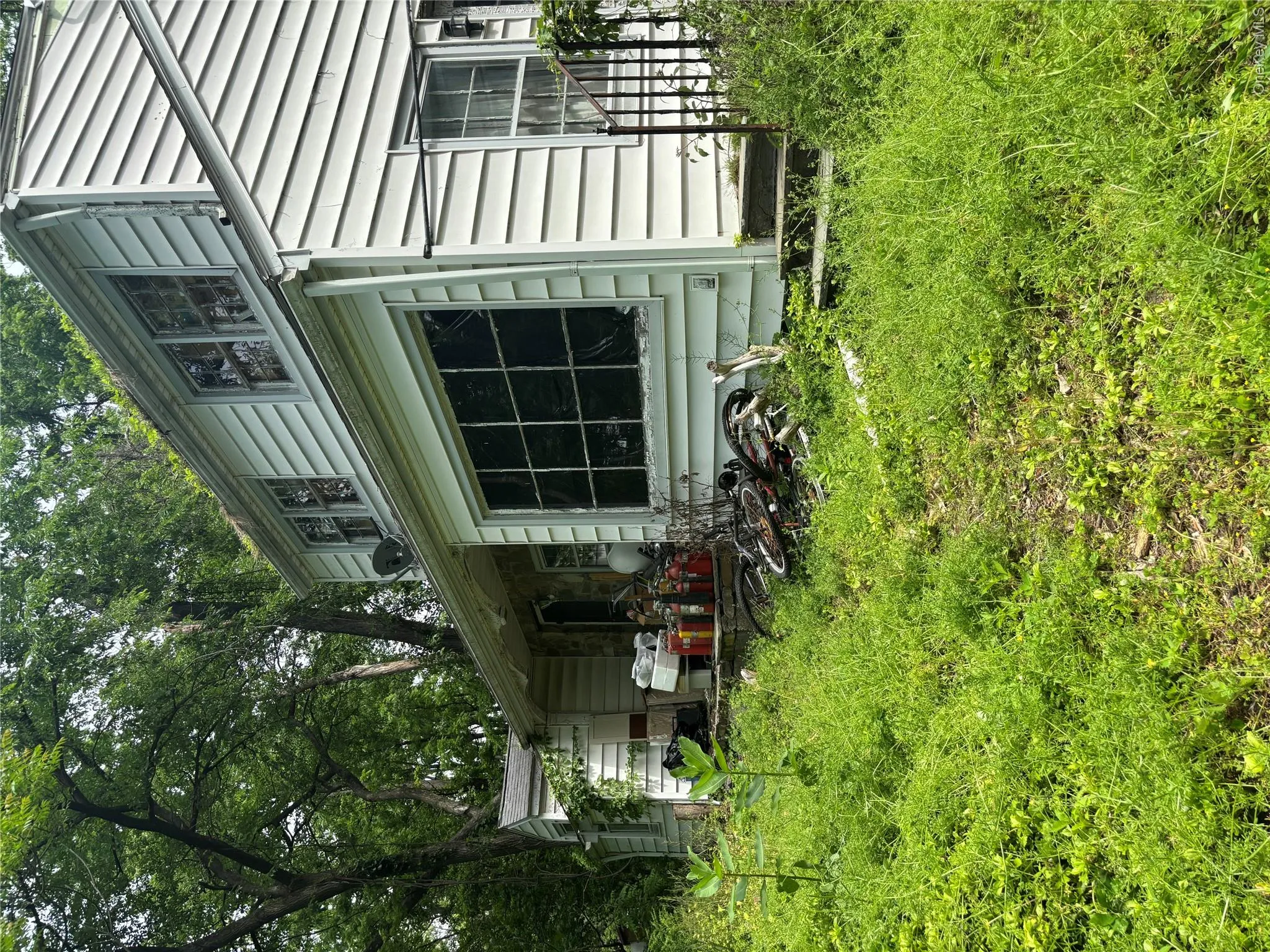 Front porch to home entry Front porch to home entry
