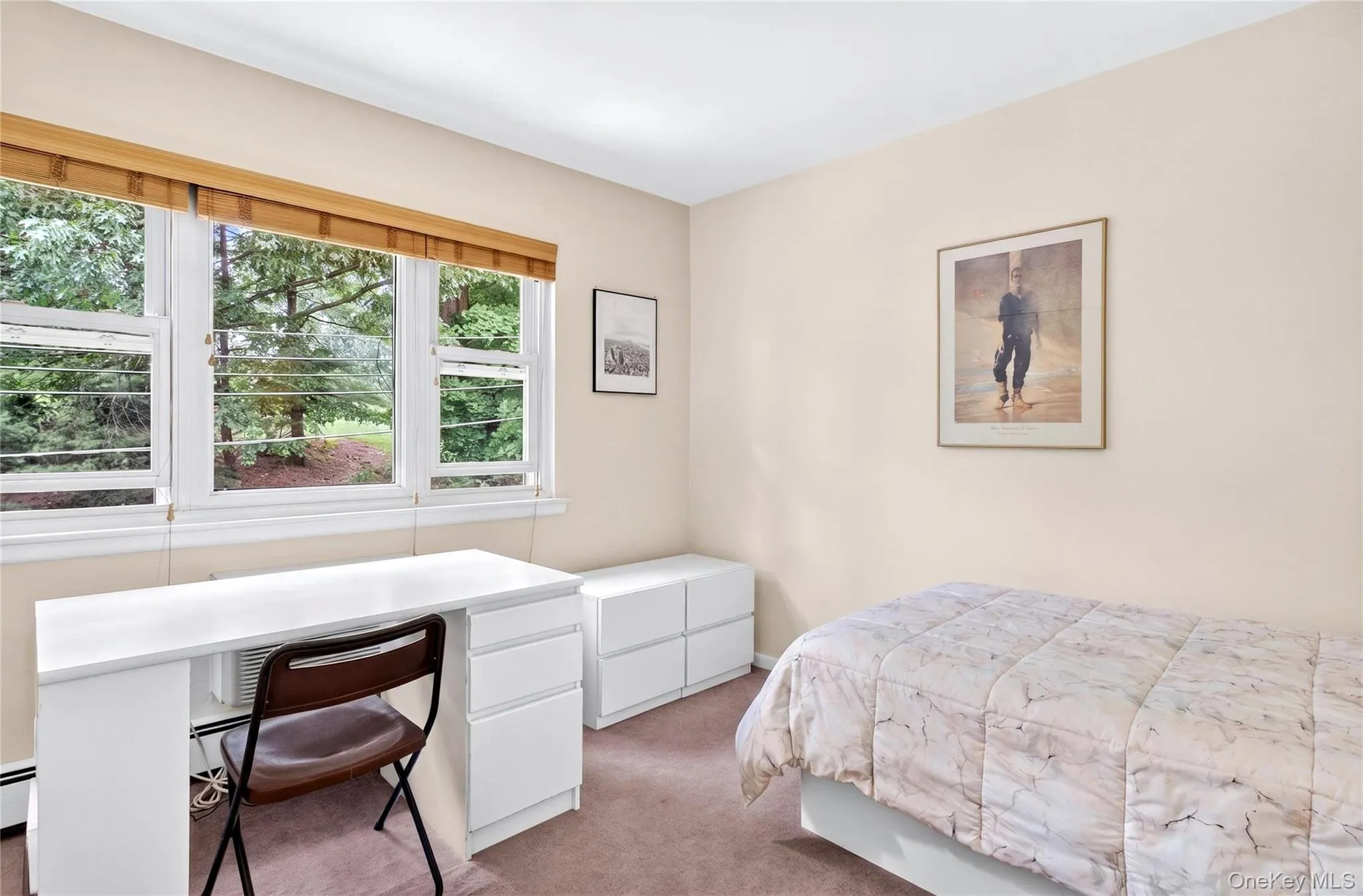 Second bedroom with view of back yard and private golf course. Second bedroom with view of back yard and private golf course.